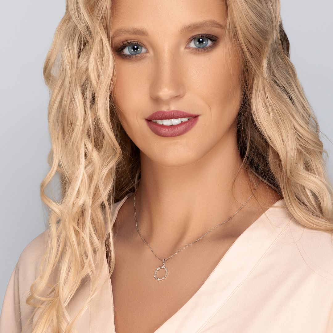 תליון זהב עגול משובץ יהלומים נוצצים