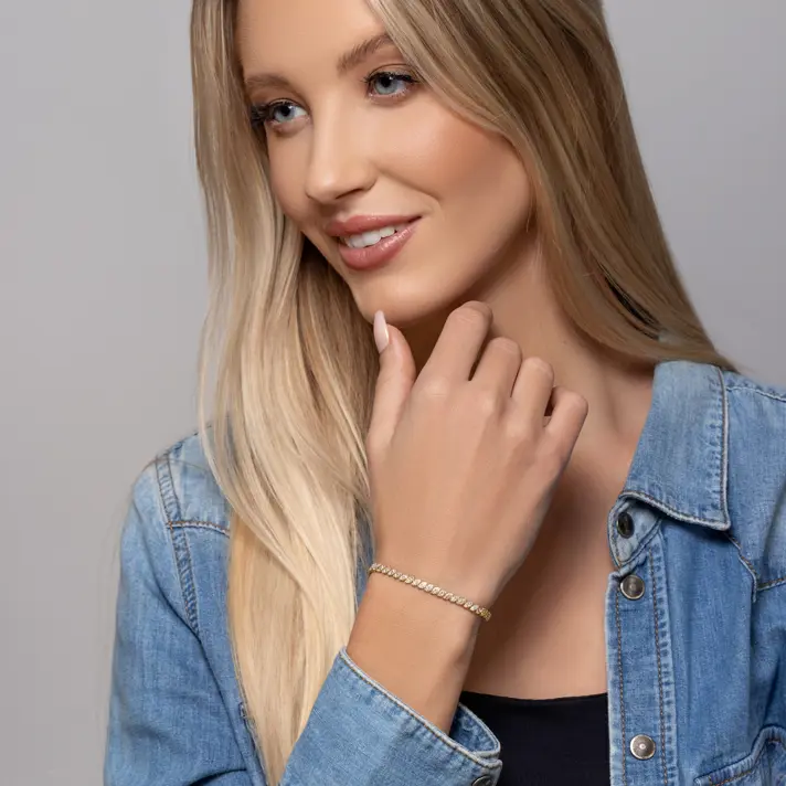 צמיד זהב טניס משובץ יהלומים בדוגמת עלים