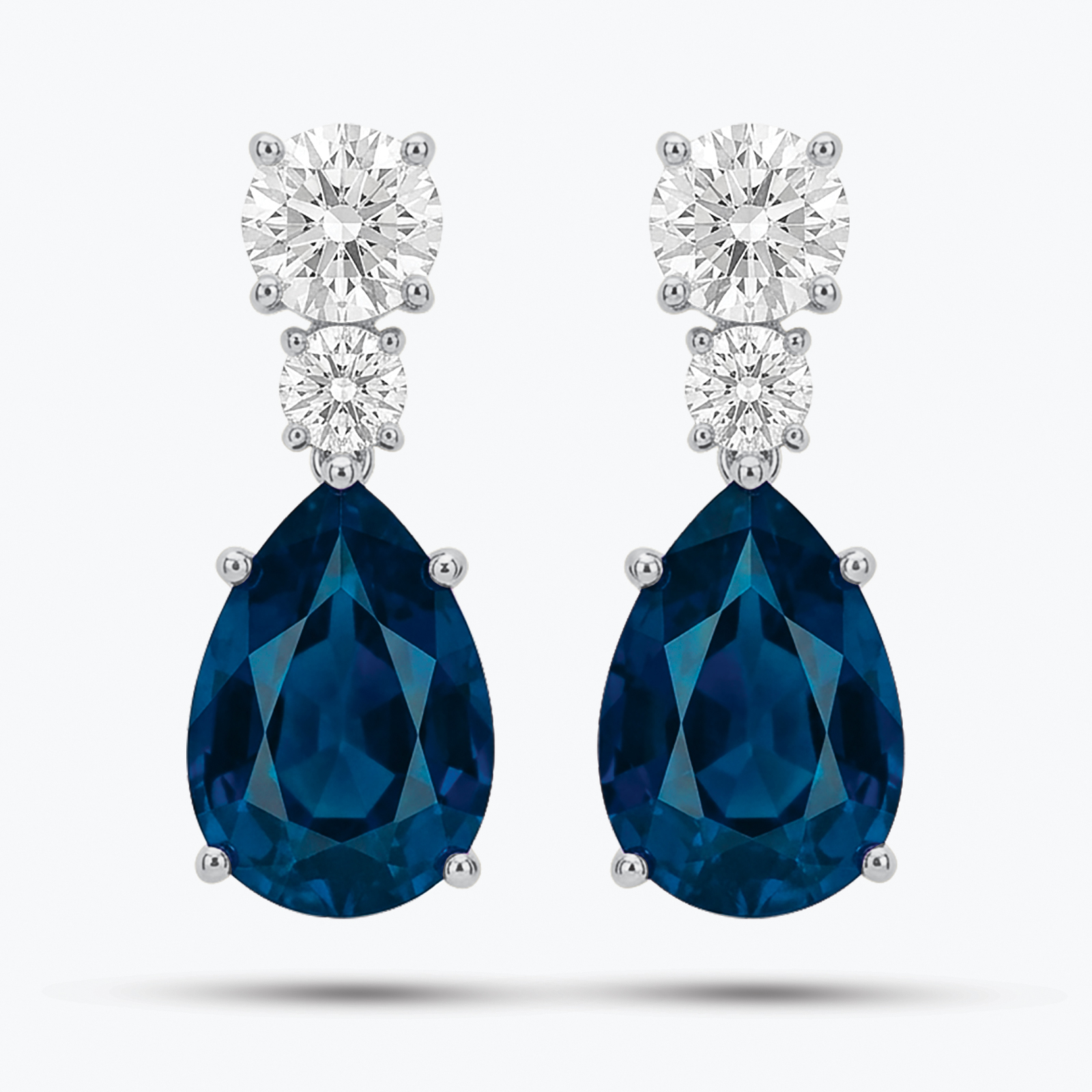 עגילי זהב לבן 14K עם ספיר ויהלומי מעבדה.