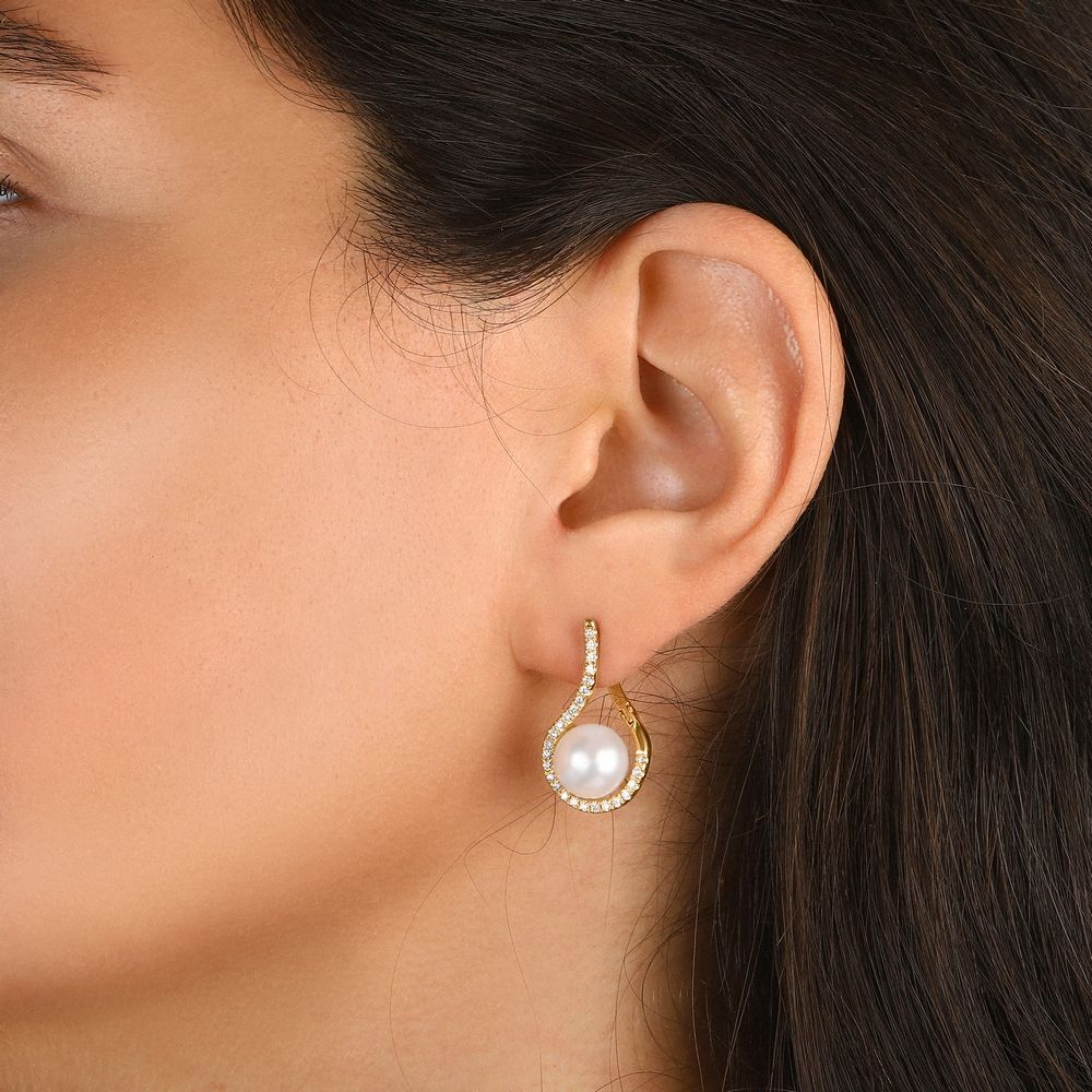 עגילי זהב עם פנינים ויהלומים