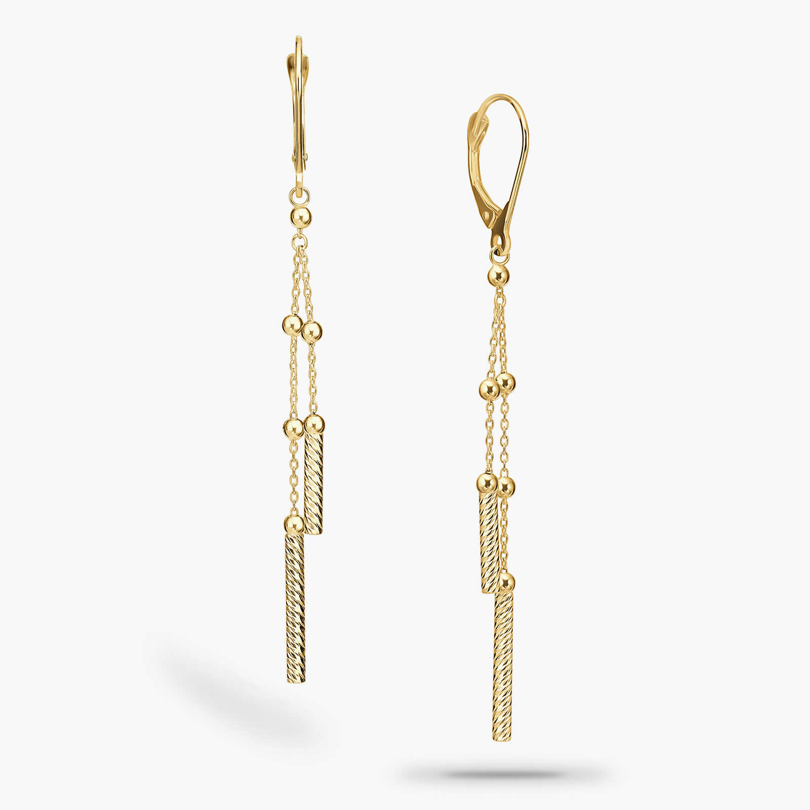 עגילי זהב עם שרשראות כפולות ובסופן חרוטי זהב