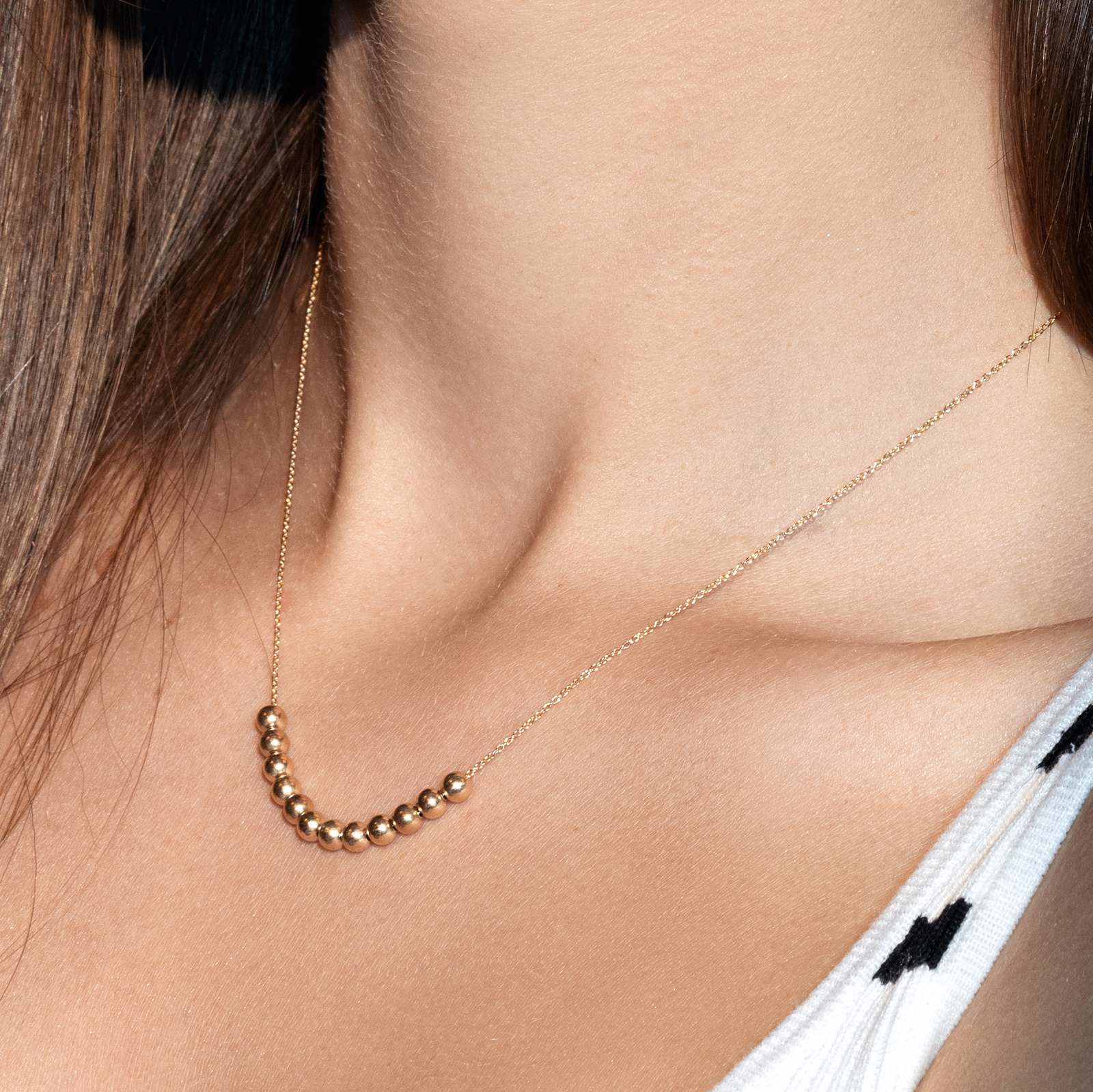 שרשרת זהב בשילוב כדורי זהב