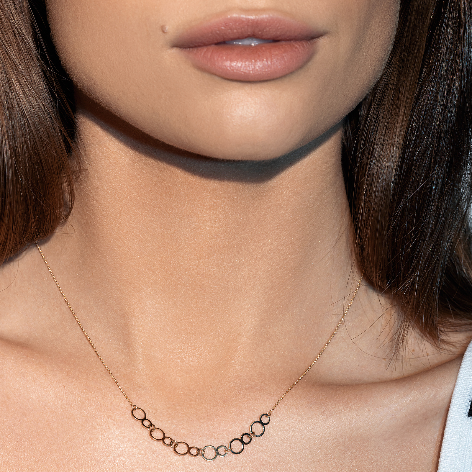 שרשרת זהב בשילוב פלטות עיגולים