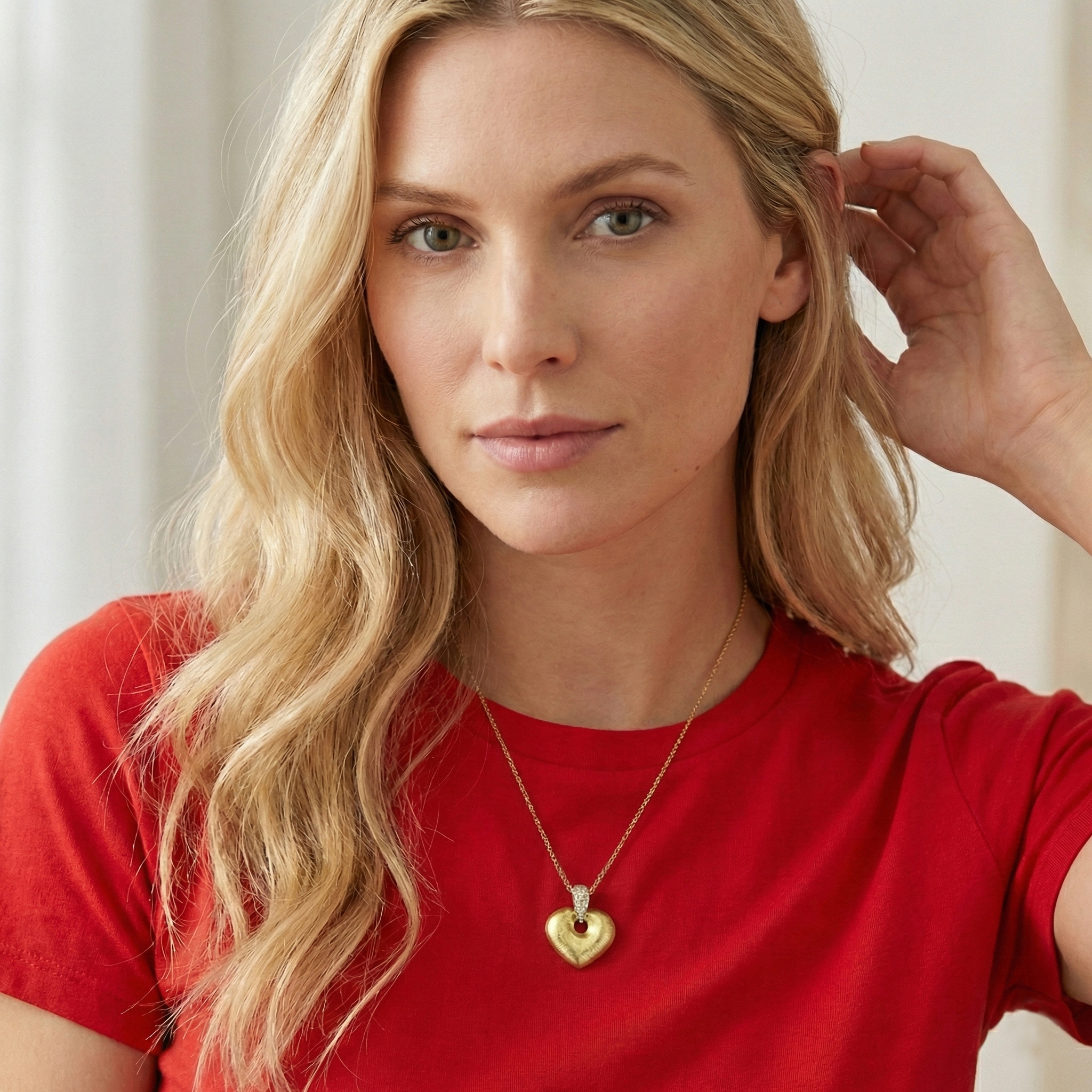 תליון לב עשוי זהב 14K בשיבוץ זרקונים