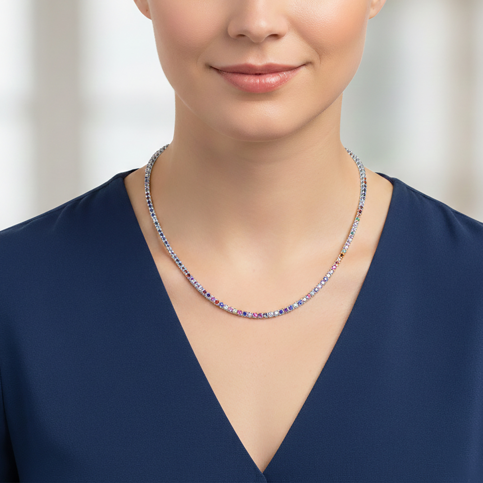 שרשרת זהב לבן 14K בשיבוץ ספירים צבעונים.