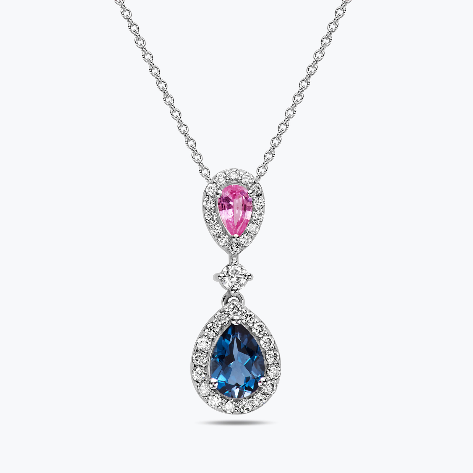 תליון זהב עם שתי טיפות בלו לונדון וספיר אחת מעל השניה מוקפות יהלומים