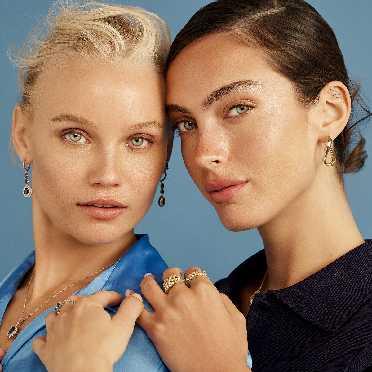 עגיל זהב בשיבוץ טיפות ספירים ויהלומים