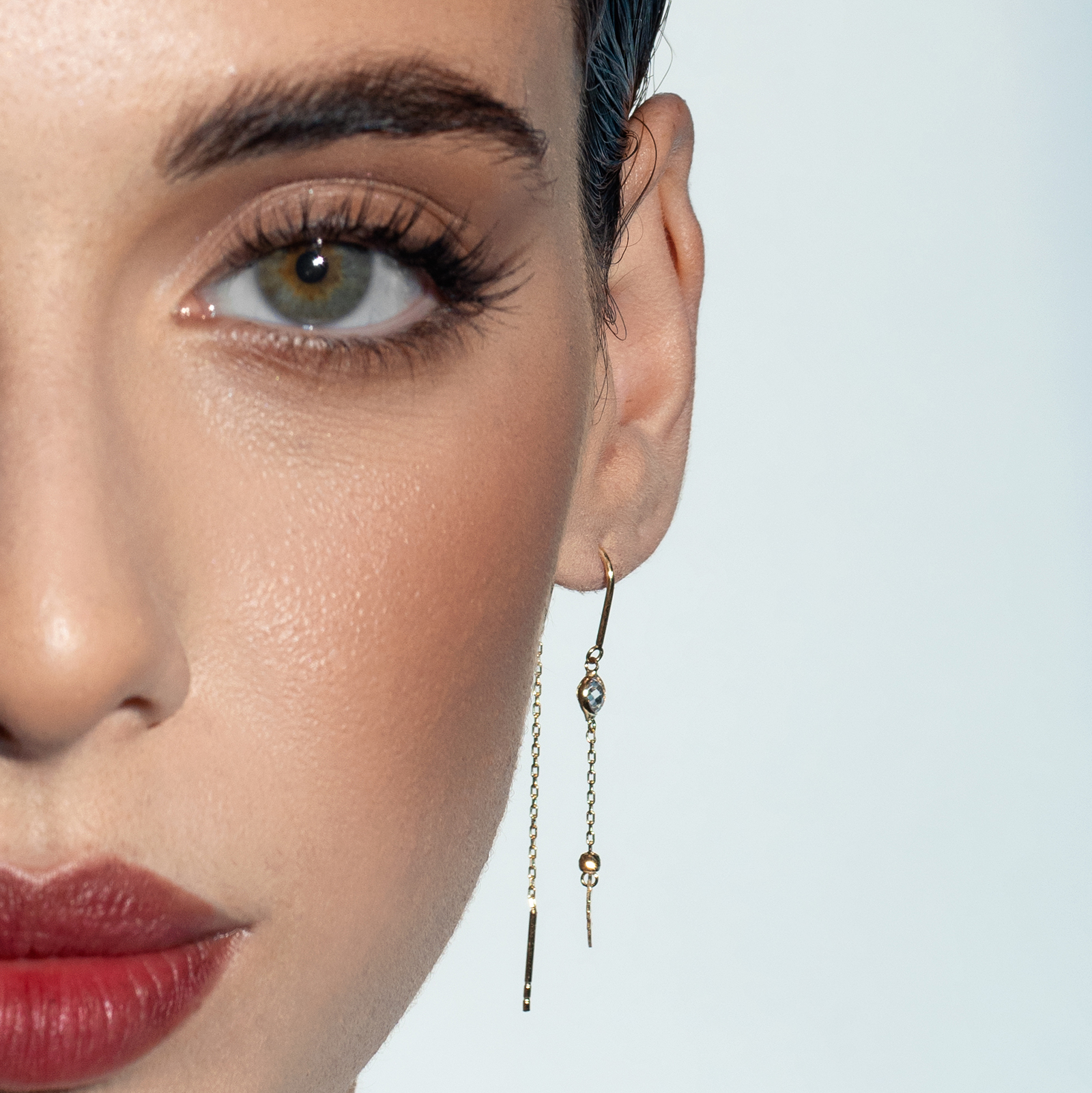 עגילי זהב ארוכים עם סיומת פיה