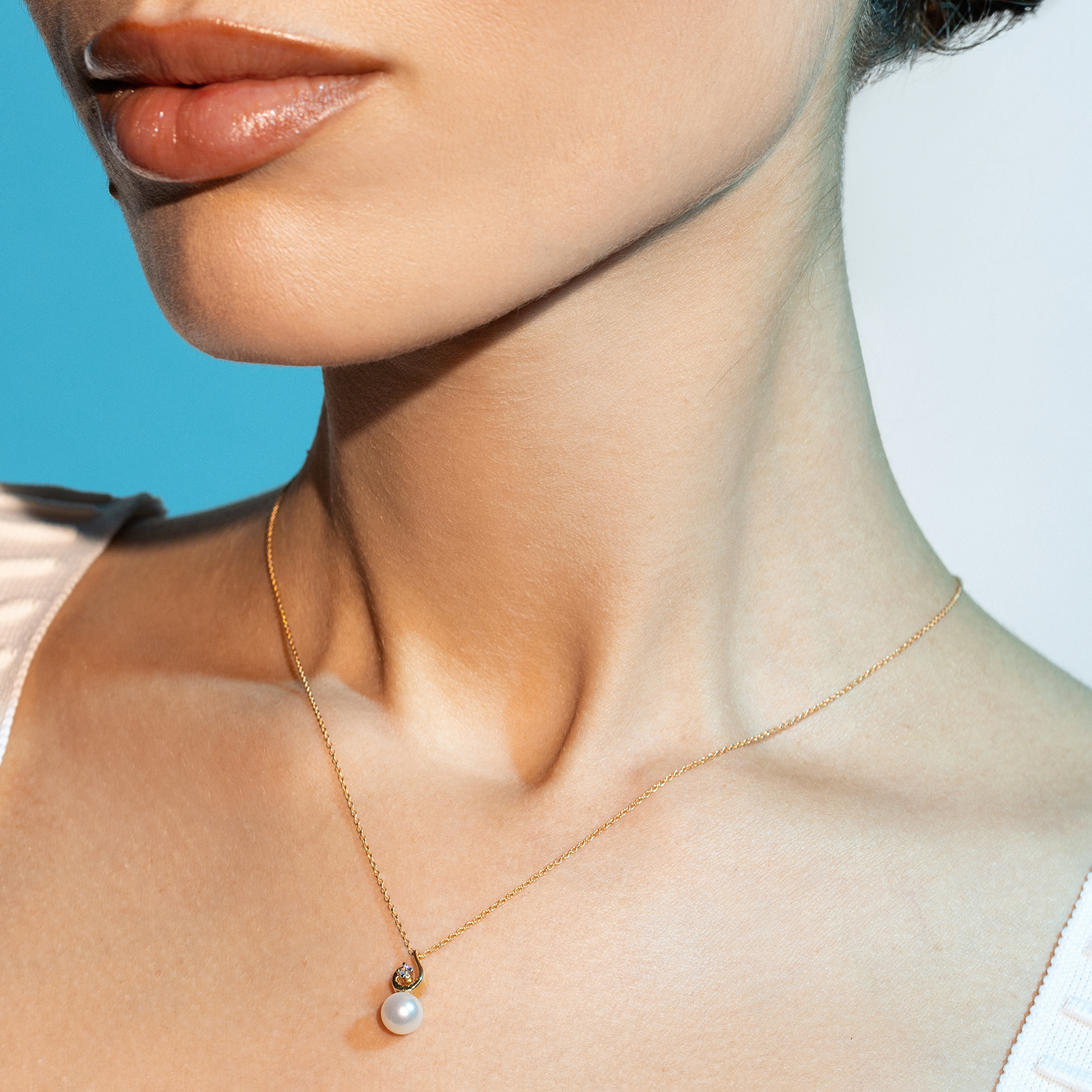 תליון זהב ופנינה