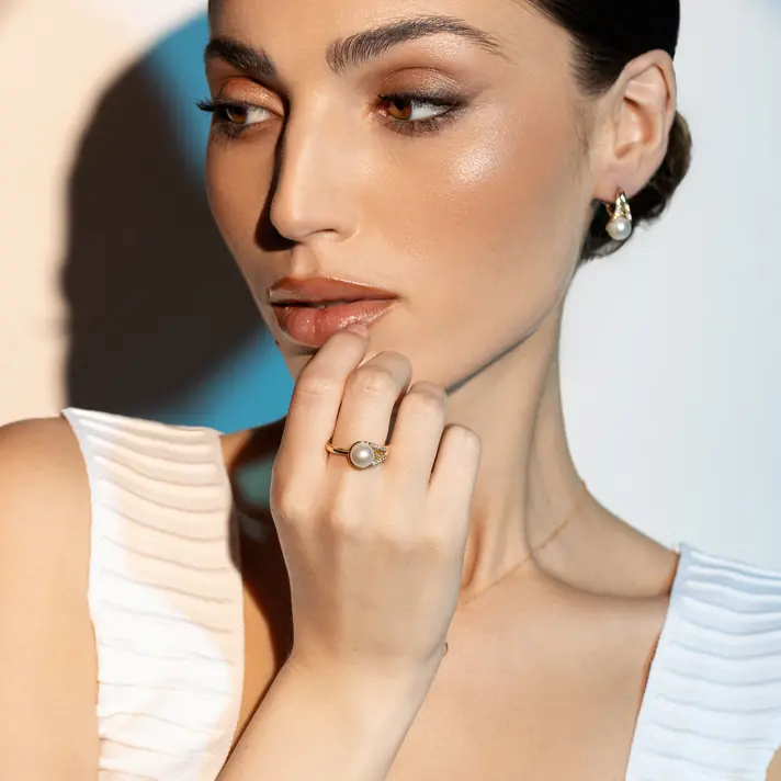 עגילי זהב בשילוב פנינה וזרקונים