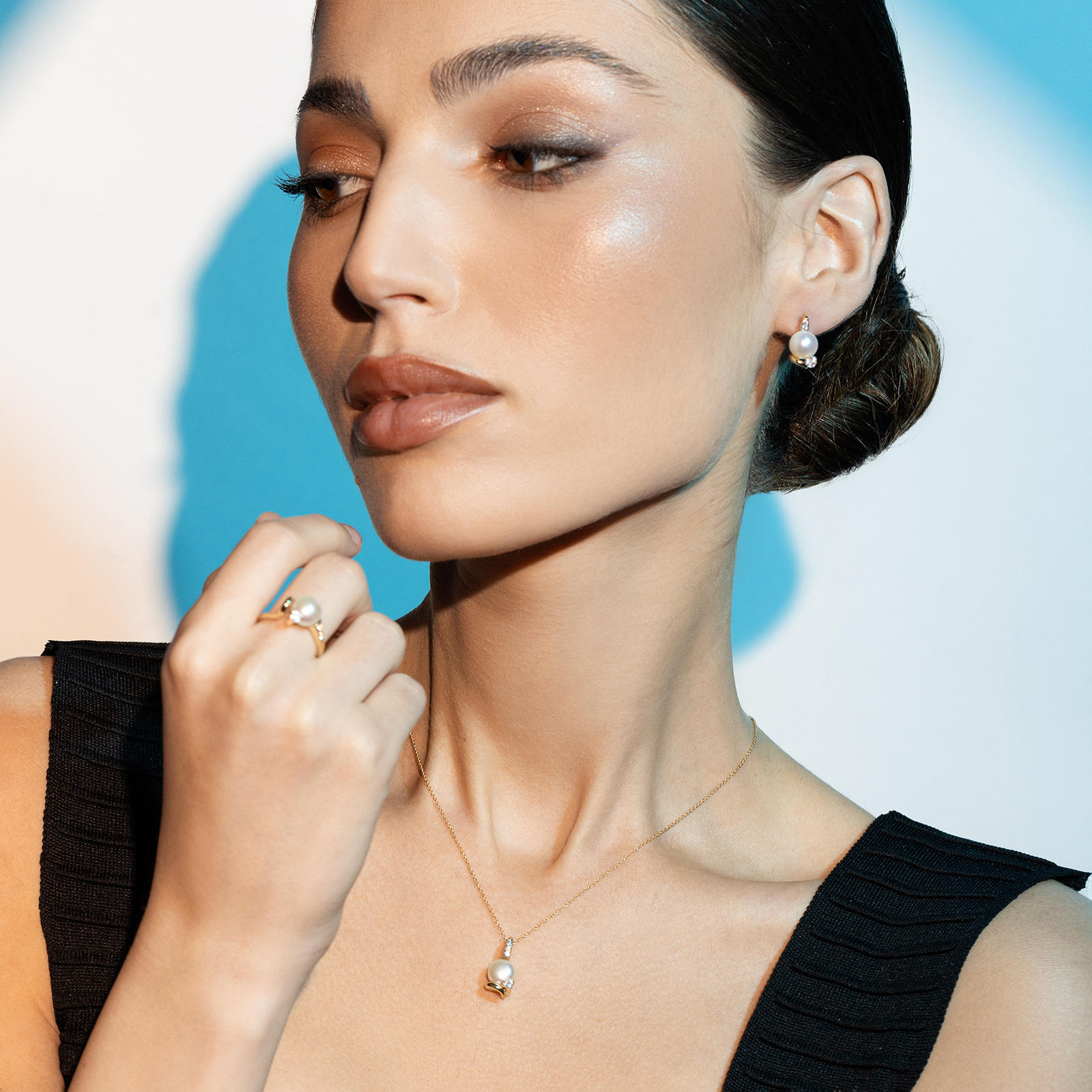 עגילי זהב בשיבוץ פנינה וזרקונים