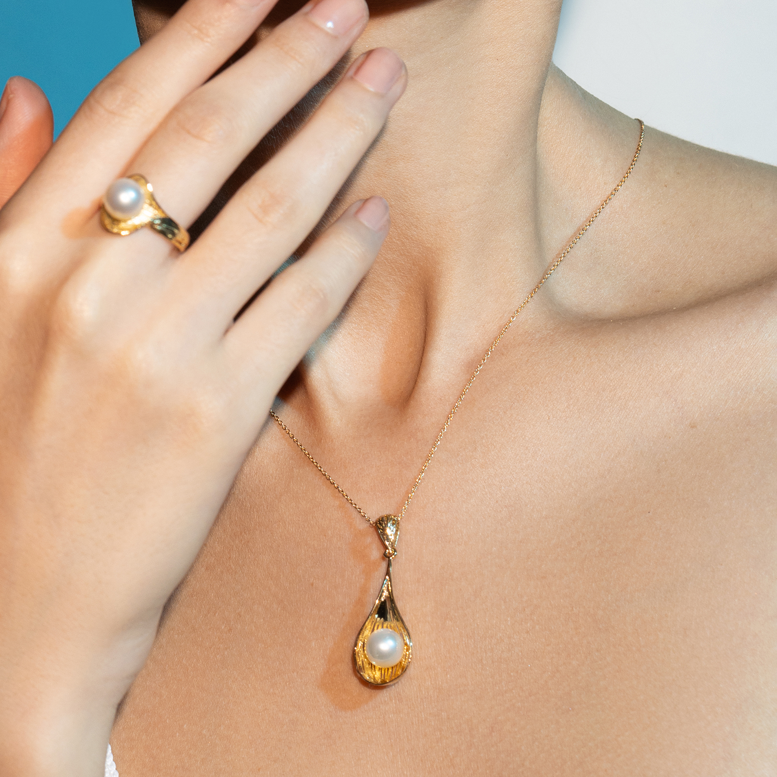 תליון זהב ופנינה