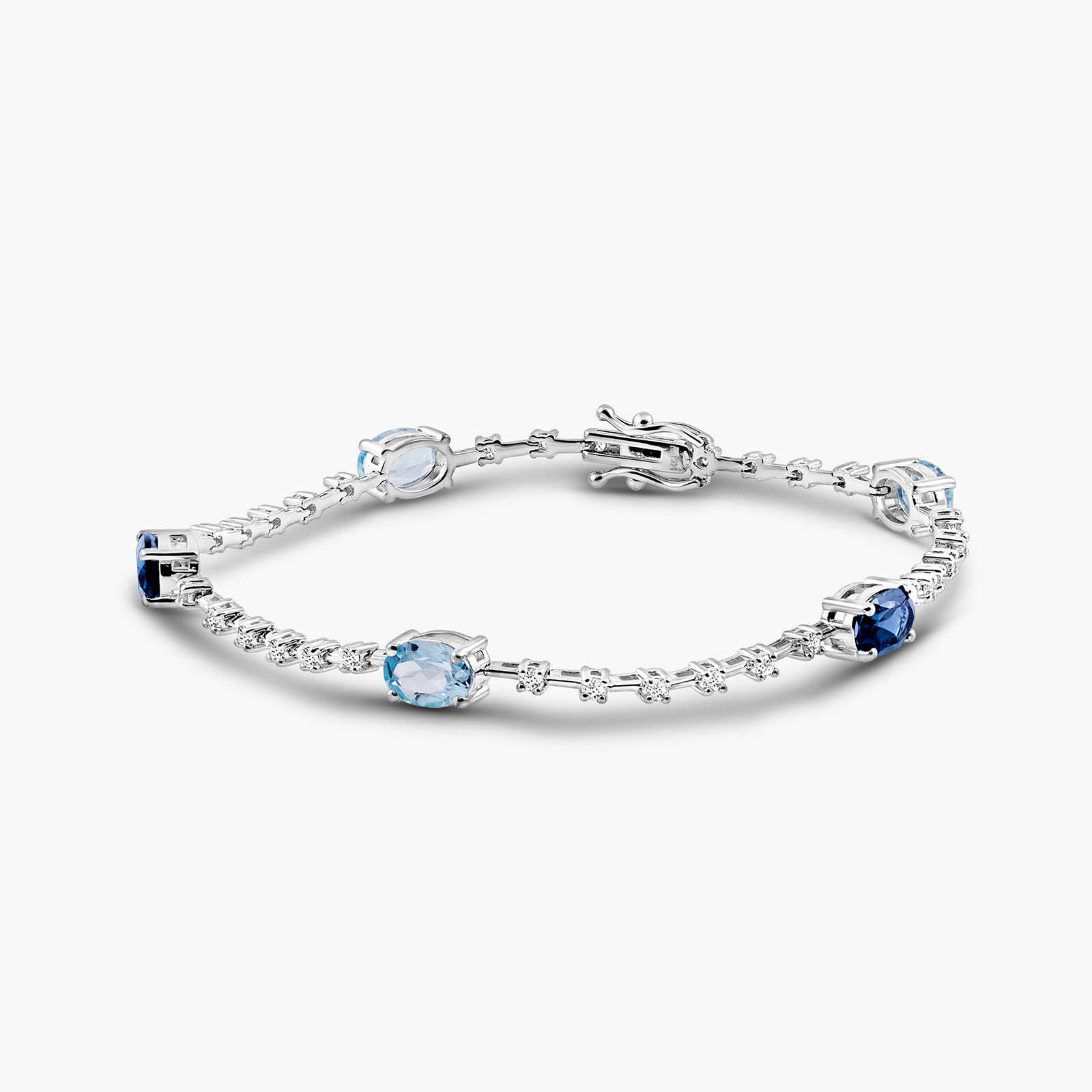 צמיד זהב משובץ יהלומים, בלו טופז ובלו לונדון