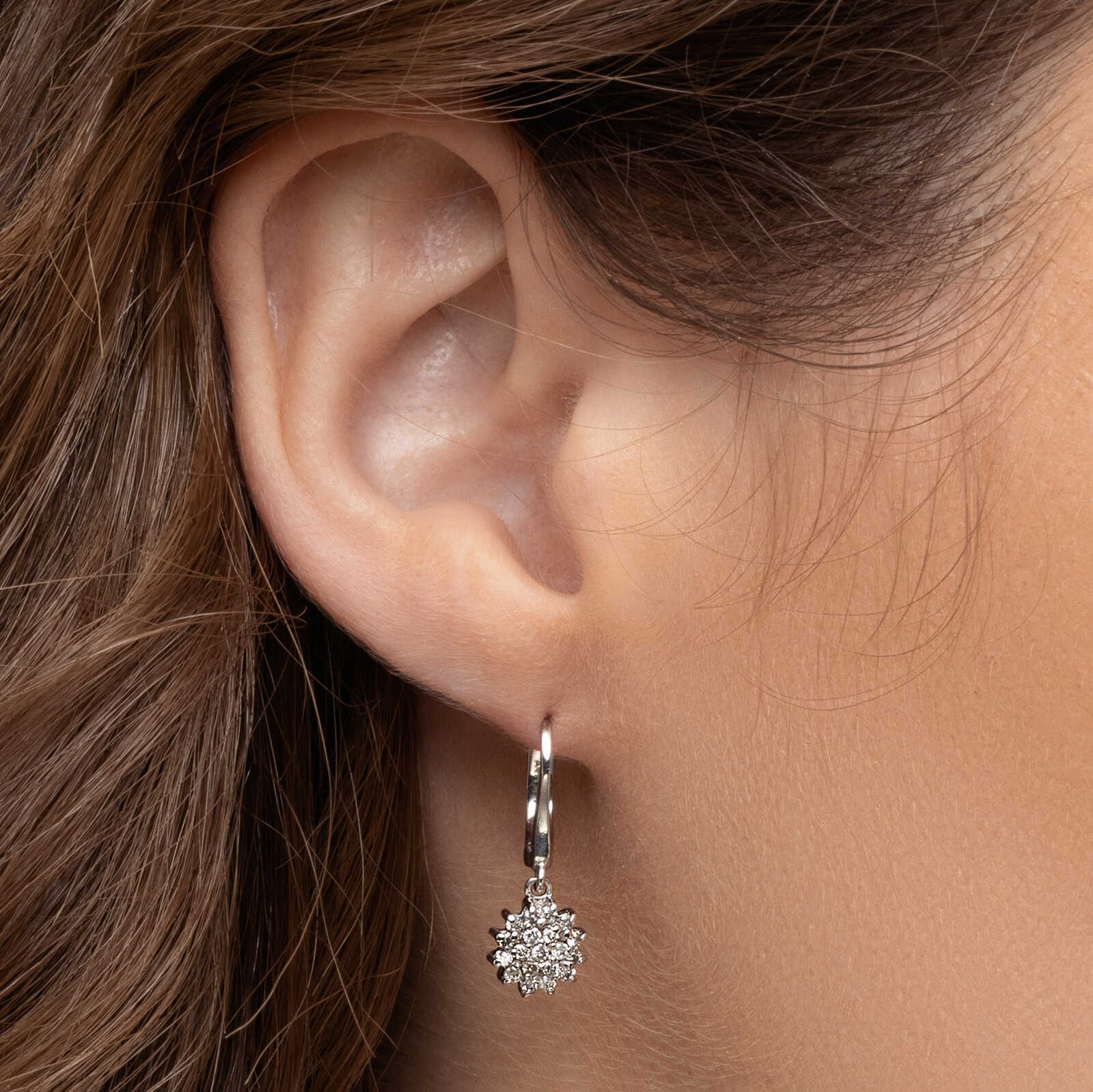 עגיל זהב בצורת שמש משובצת יהלומים