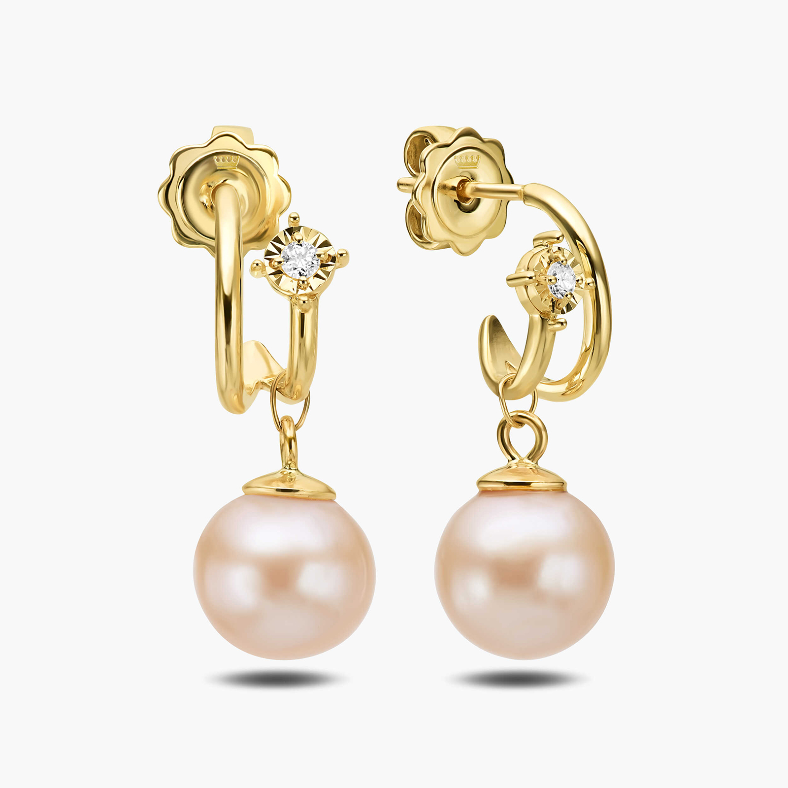 עגילי פנינה בשיבוץ יהלום