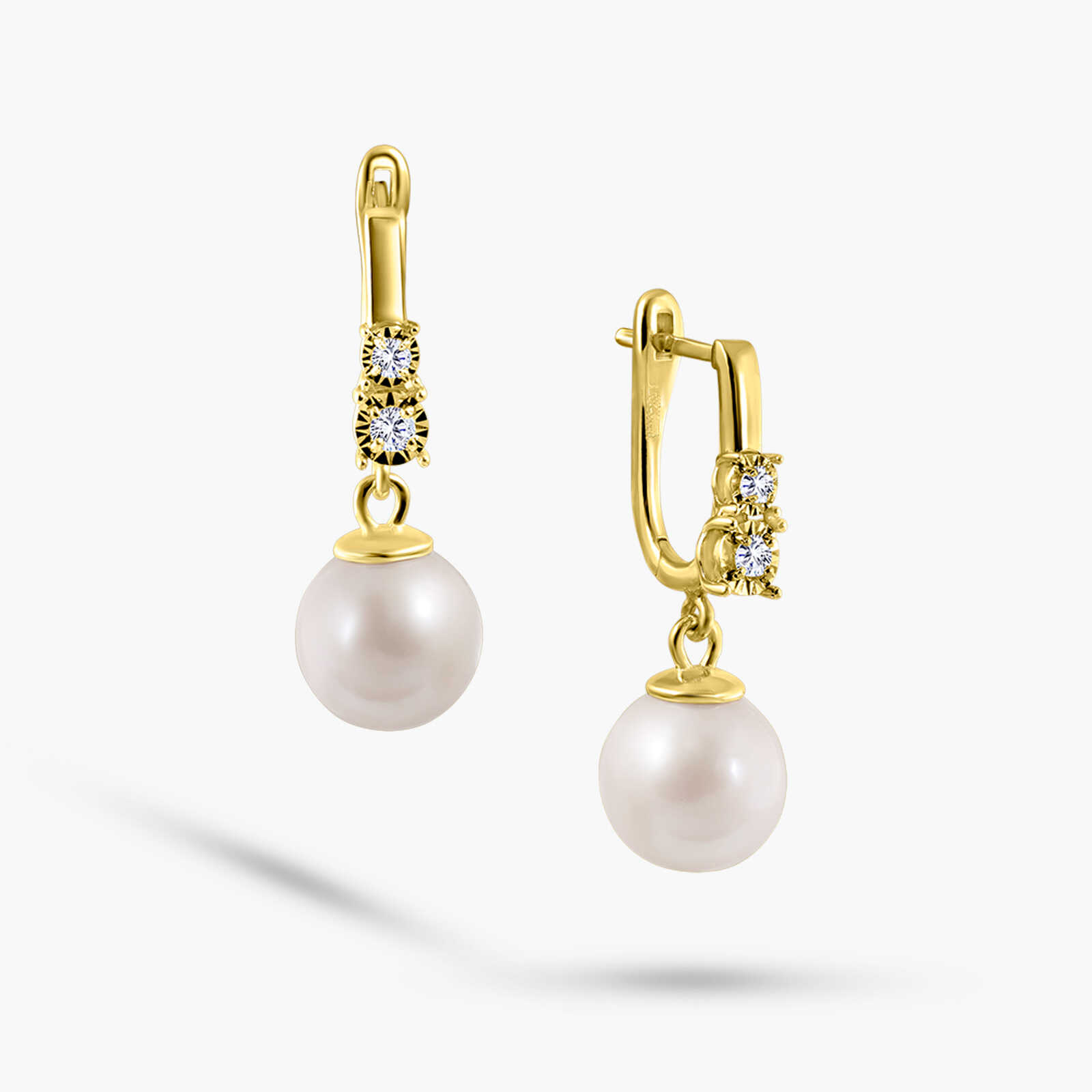 עגילי יהלומים ופנינים