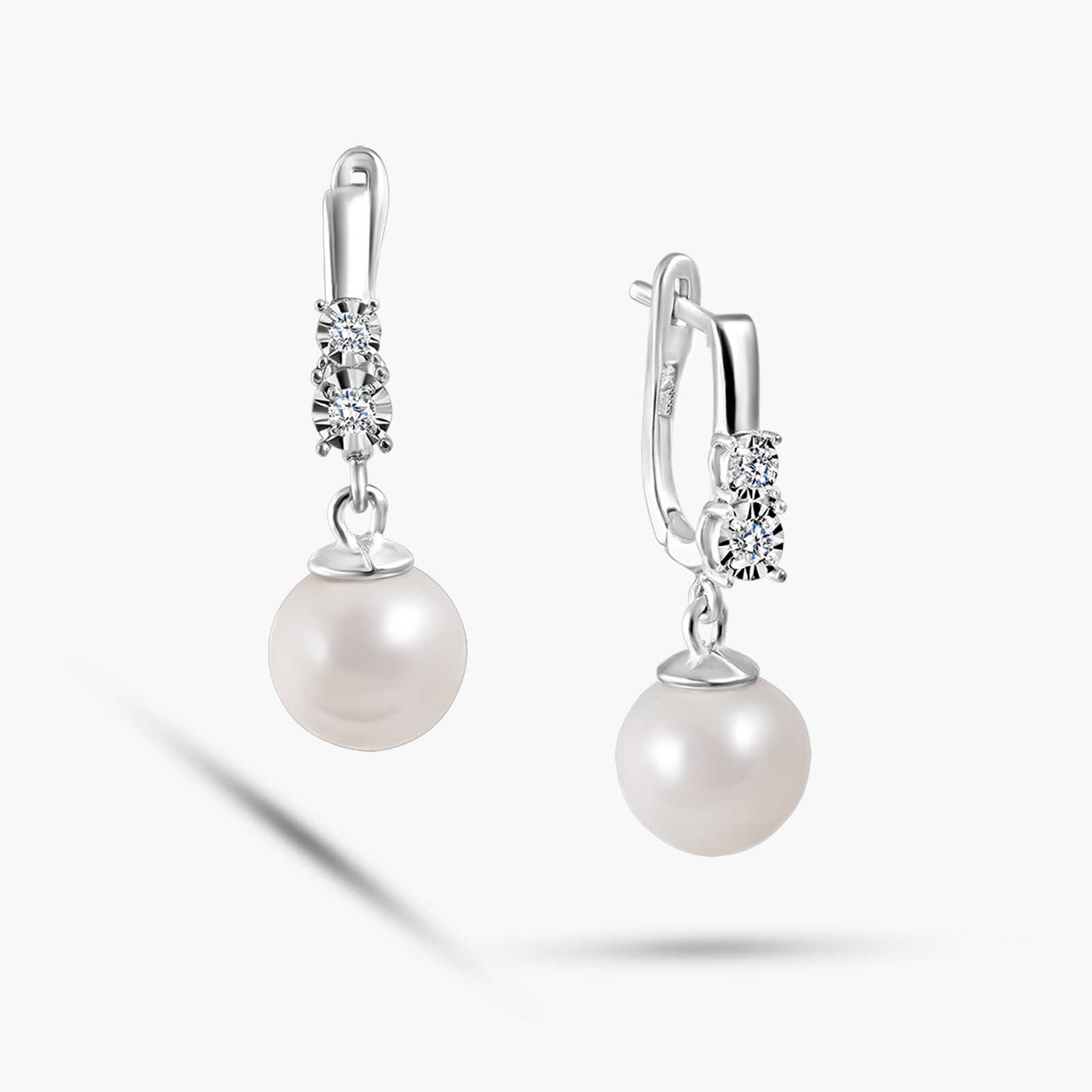 עגילי יהלומים ופנינים