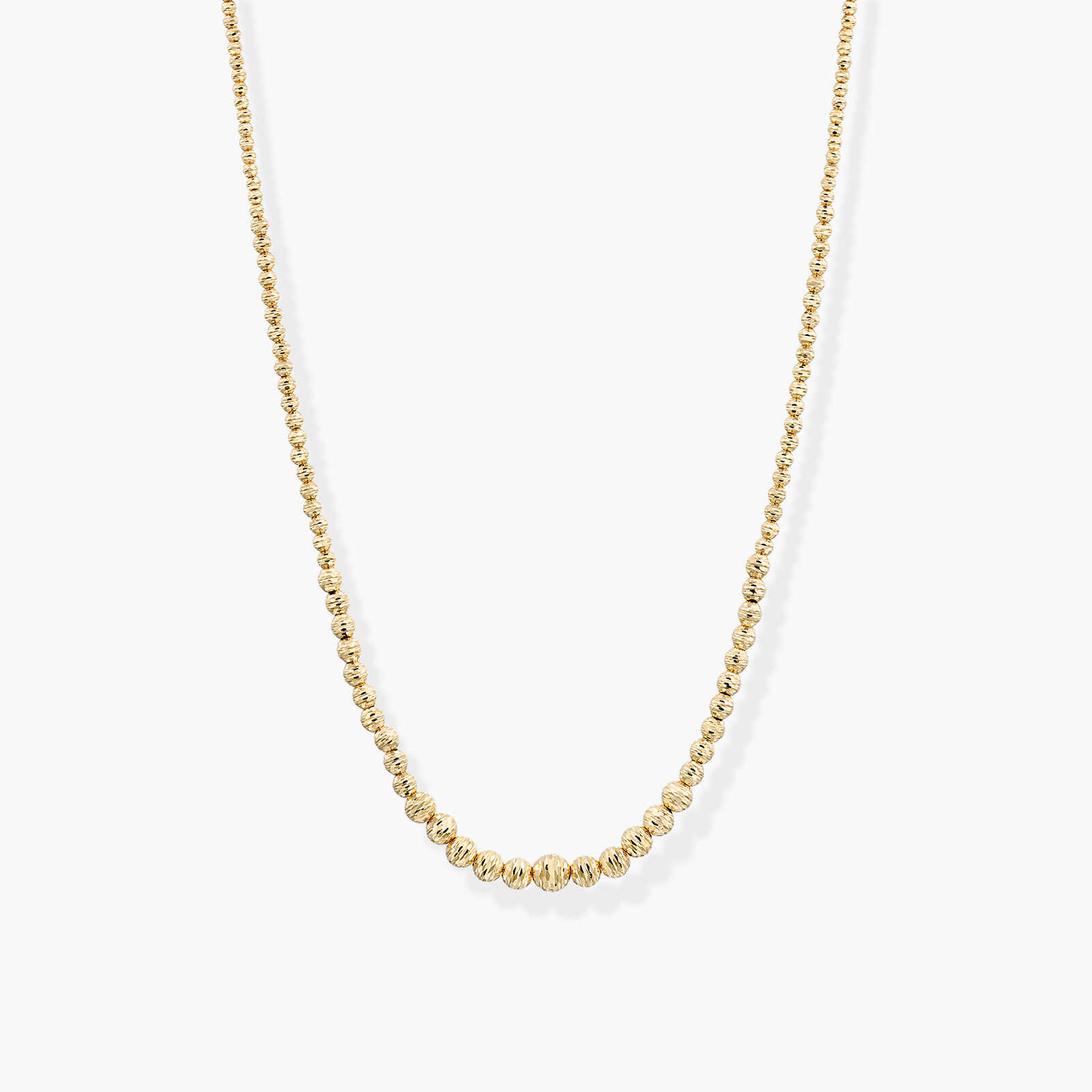 שרשרת זהב הבנויה חרוזים בגדלים משתנים