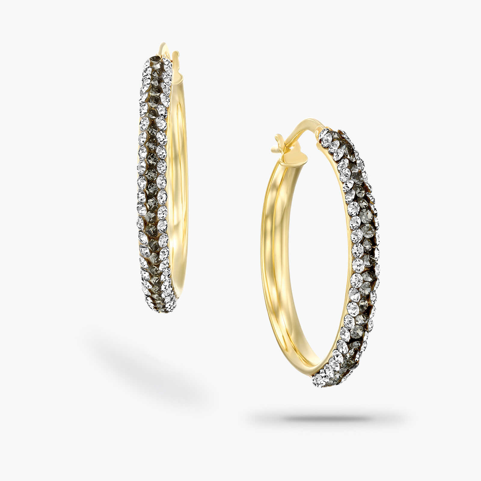 עגילי זהב חישוקיים עם זירקונים ואבני חן שחורות.