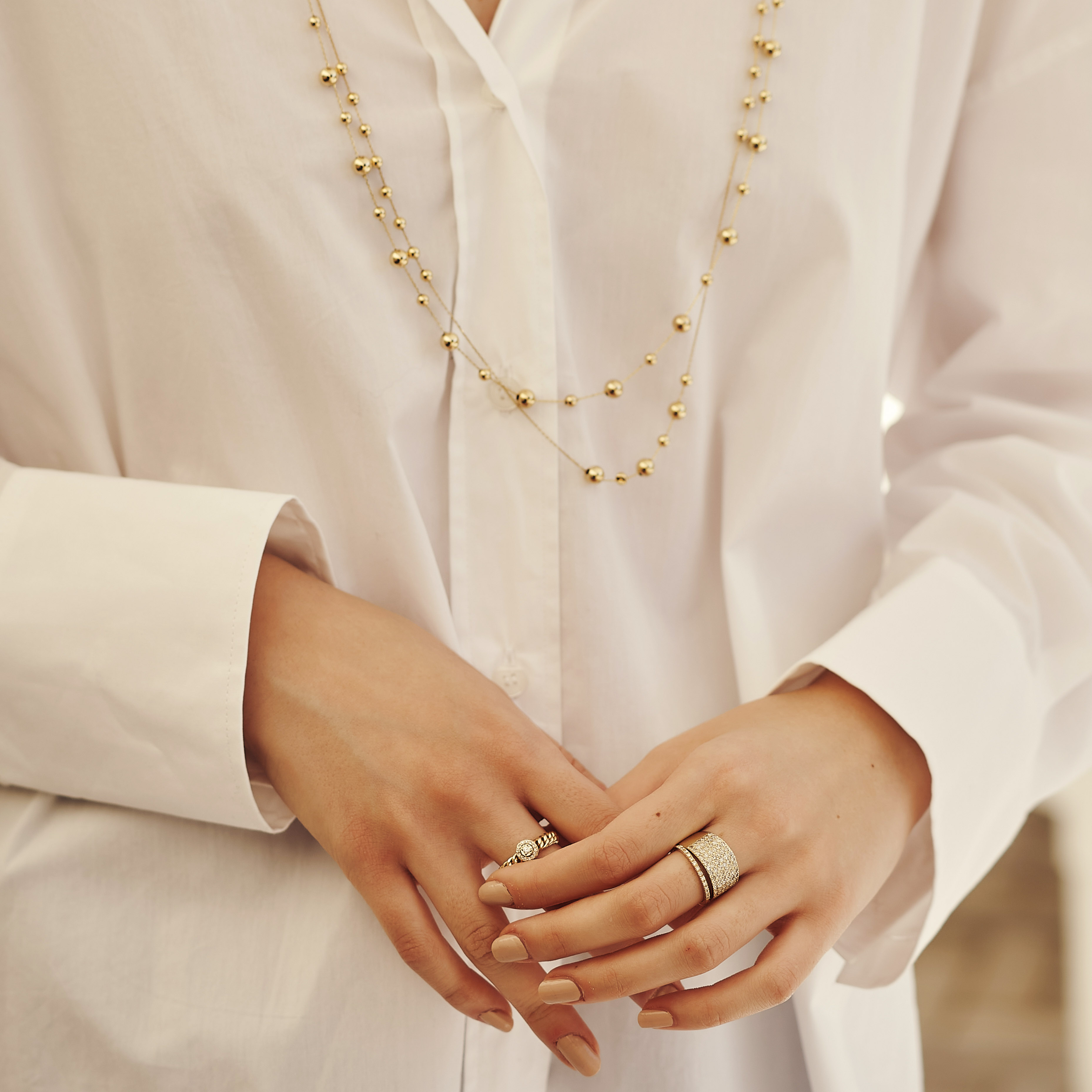 שרשרת כדוריות זהב ארוכה באורך מטר