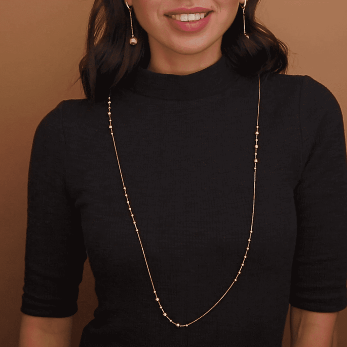 שרשרת זהב באורך מטר עם כדוריות זהב