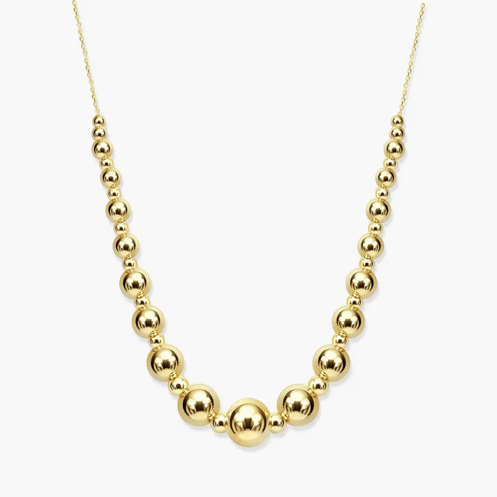 שרשרת  כדוריות זהב מבריקות בגדלים משתנים