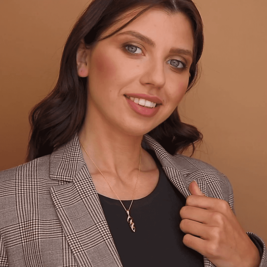 תליון זהב ספירלי מצופה קריסטלים נוצצים