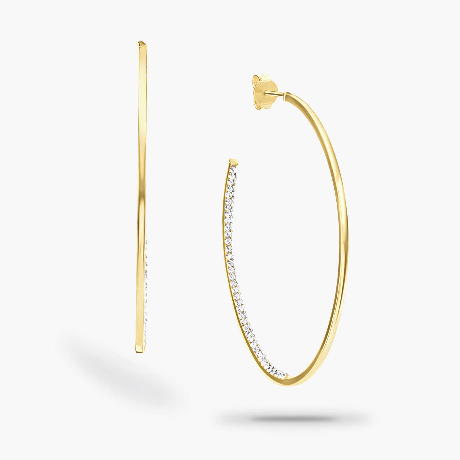 עגילי זהב אליפסיים משובצים בזירקונים בצידם הפנימי