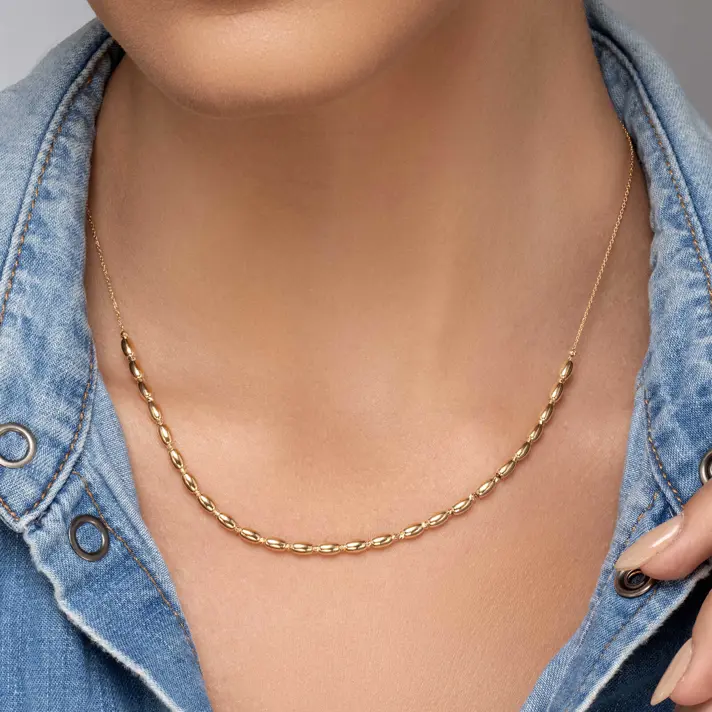 שרשרת זהב עם חוליות אורז וכדורי זהב בעיבוד לייזר