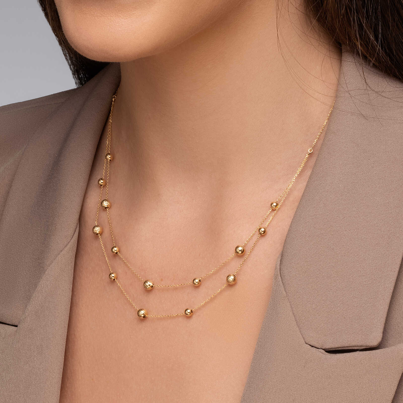 שרשרת זהב כפולה עם כדורי זהב