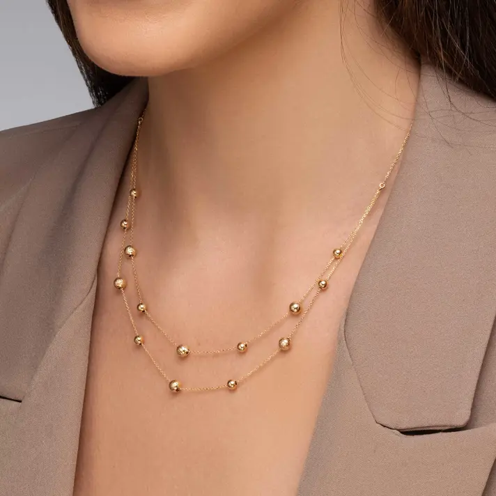 שרשרת זהב כפולה עם כדורי זהב