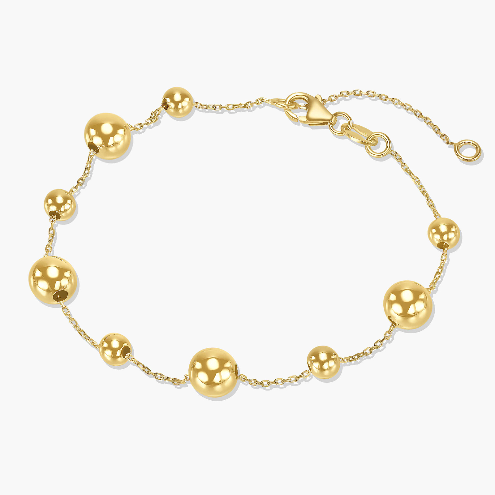 צמיד זהב בשילוב כדורי זהב בקוטר משתנה