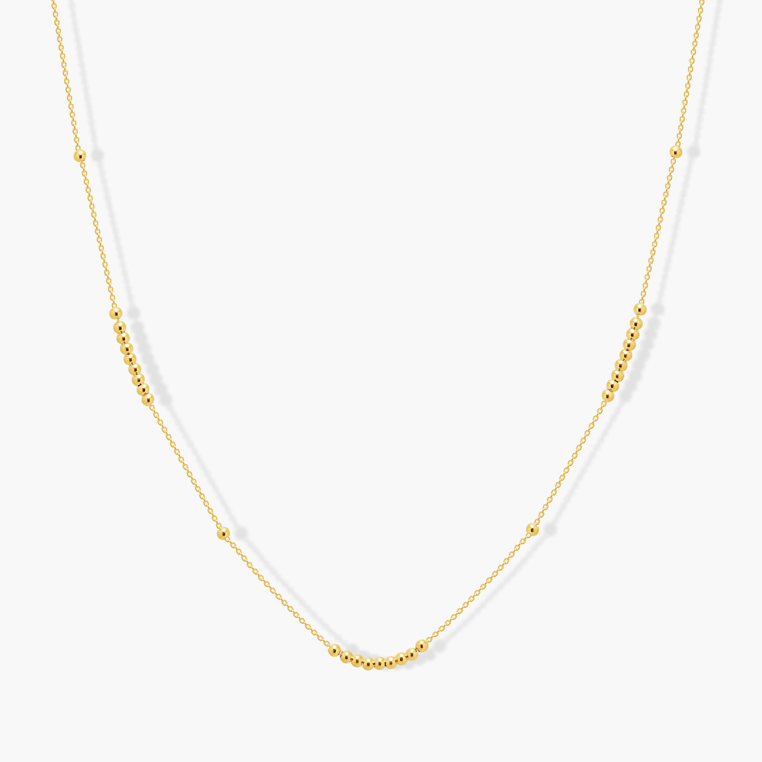 שרשרת זהב בשילוב כדורי זהב מבריקים