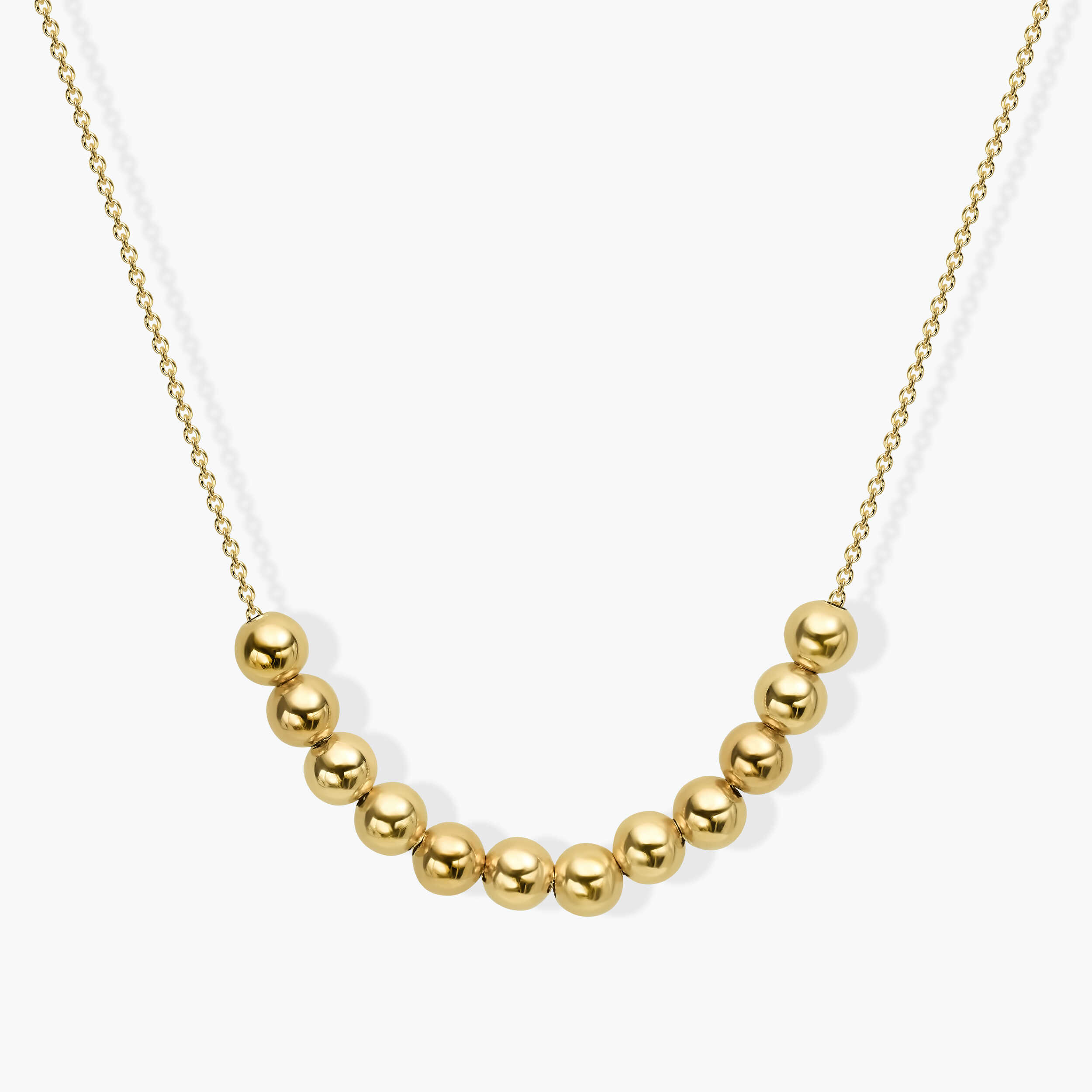 שרשרת זהב בשילוב כדורי זהב