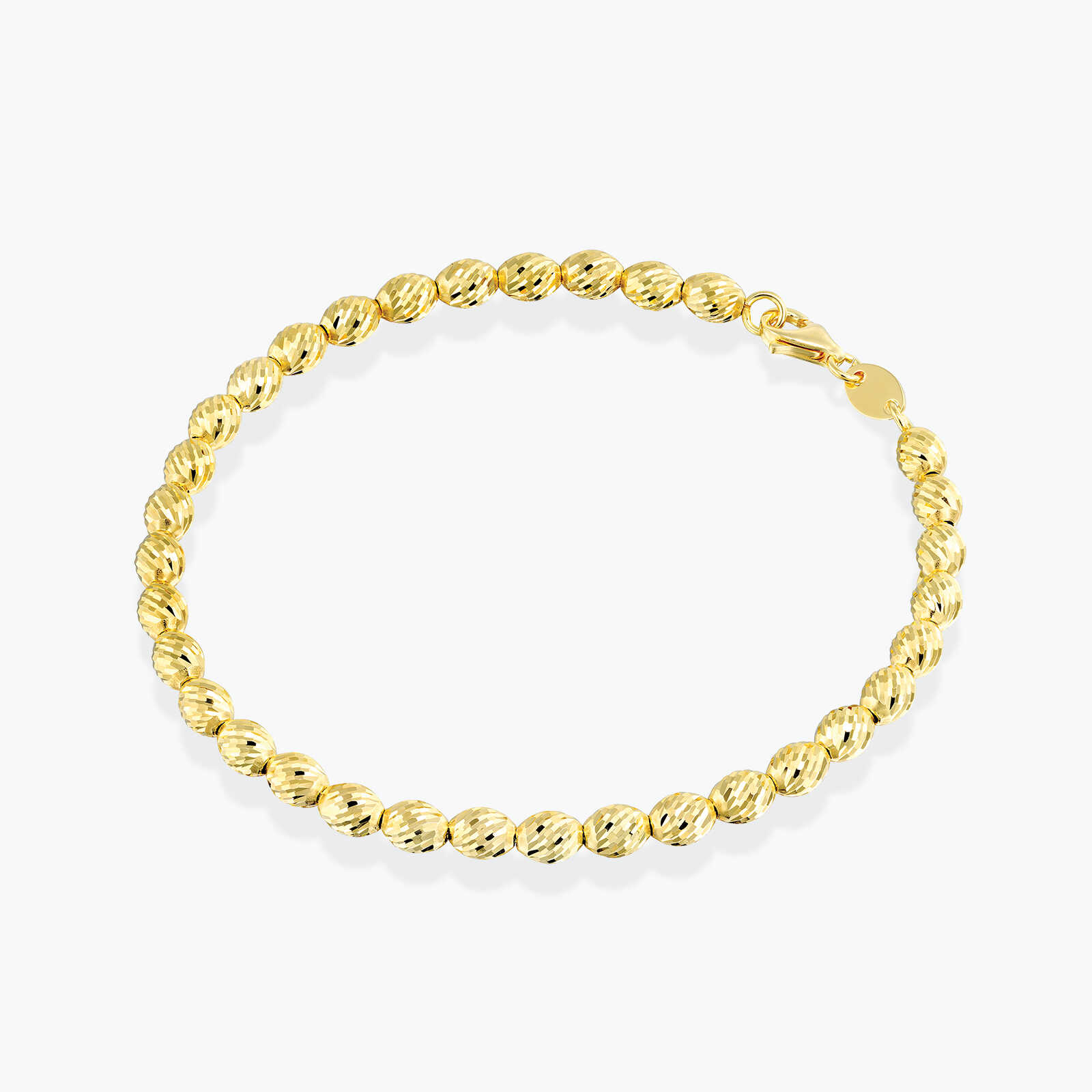 צמיד זהב המורכב מכדוריות בעיבוד לייזר