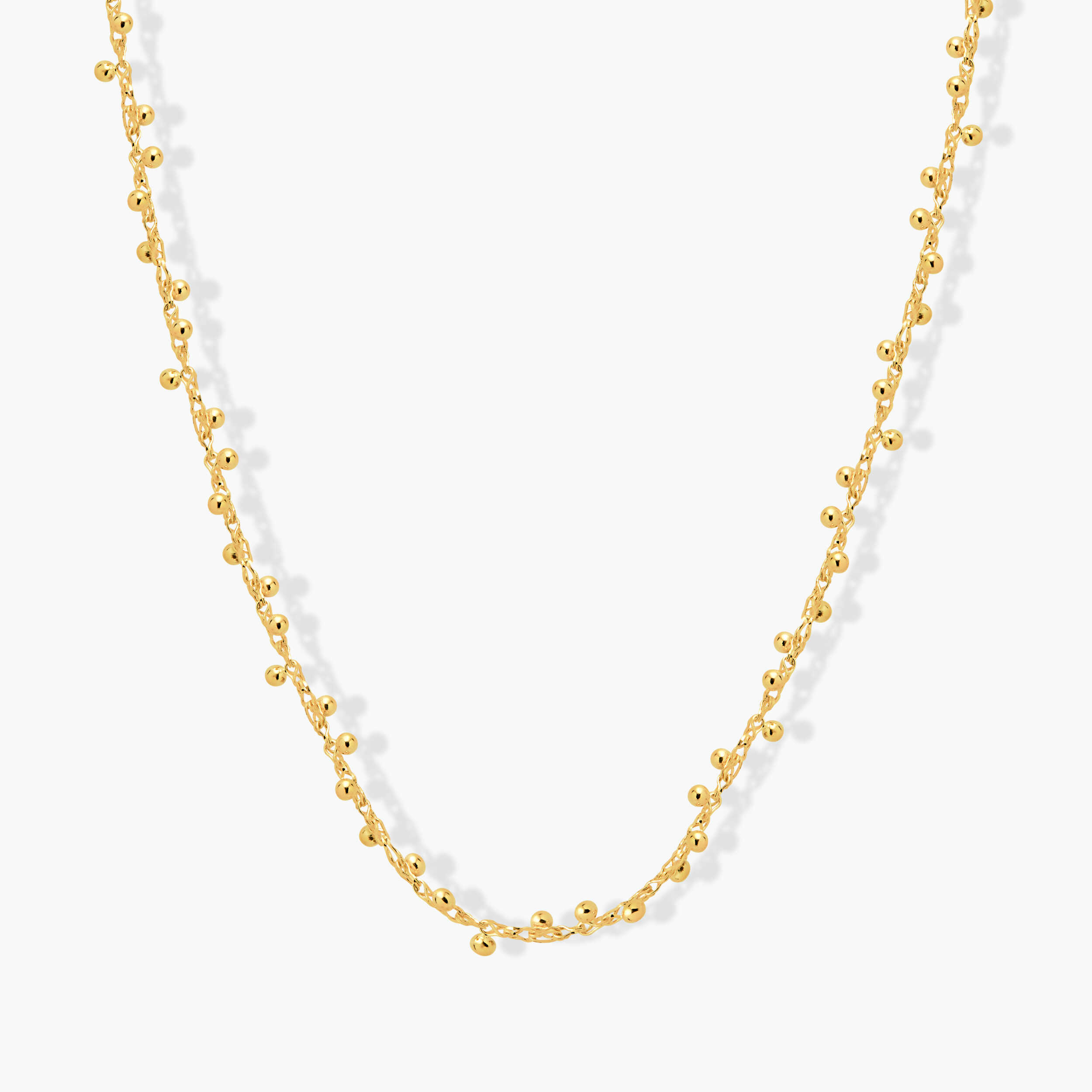 שרשרת זהב בשילוב כדורי זהב מבריקים