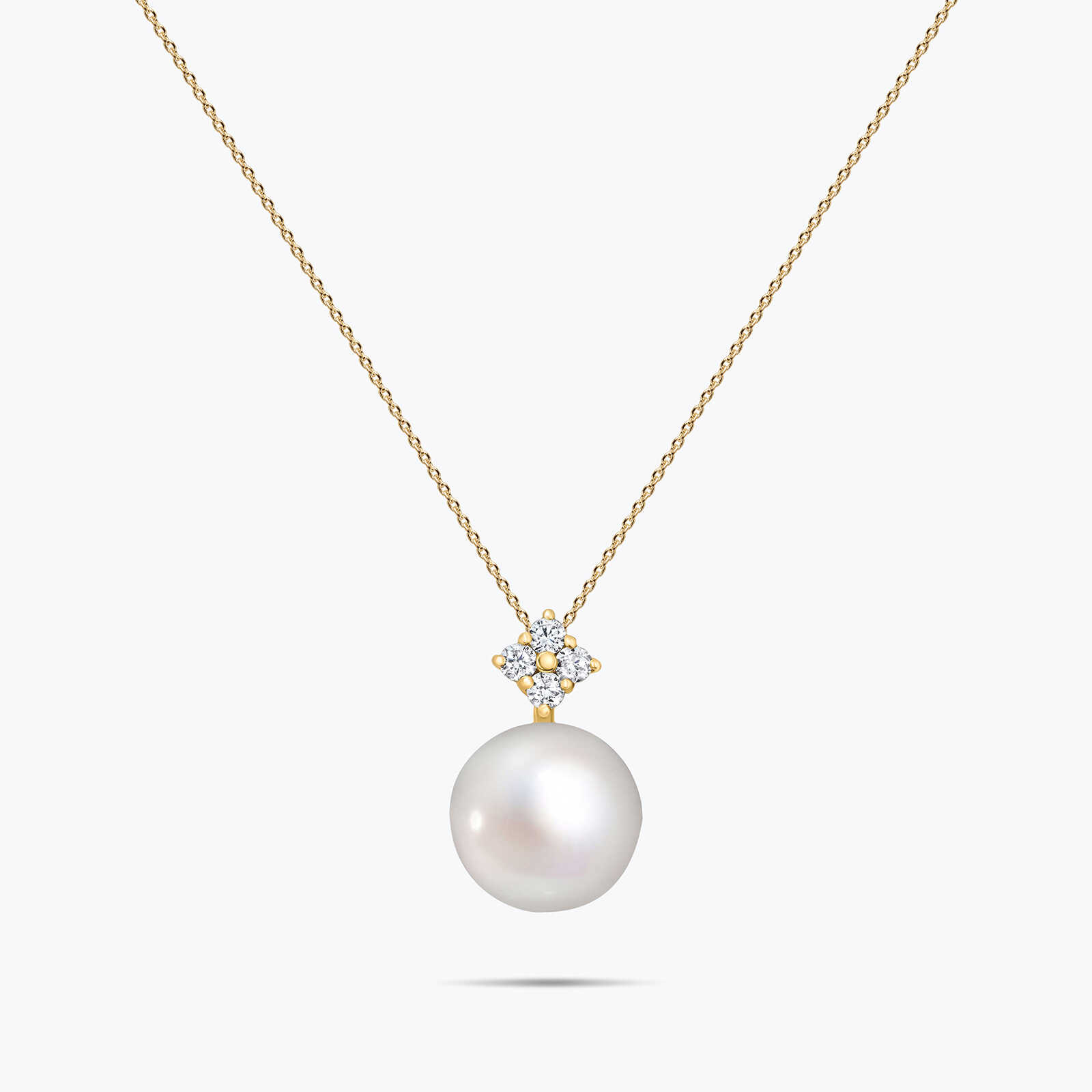 תליון זהב משובץ פנינה ויהלומים