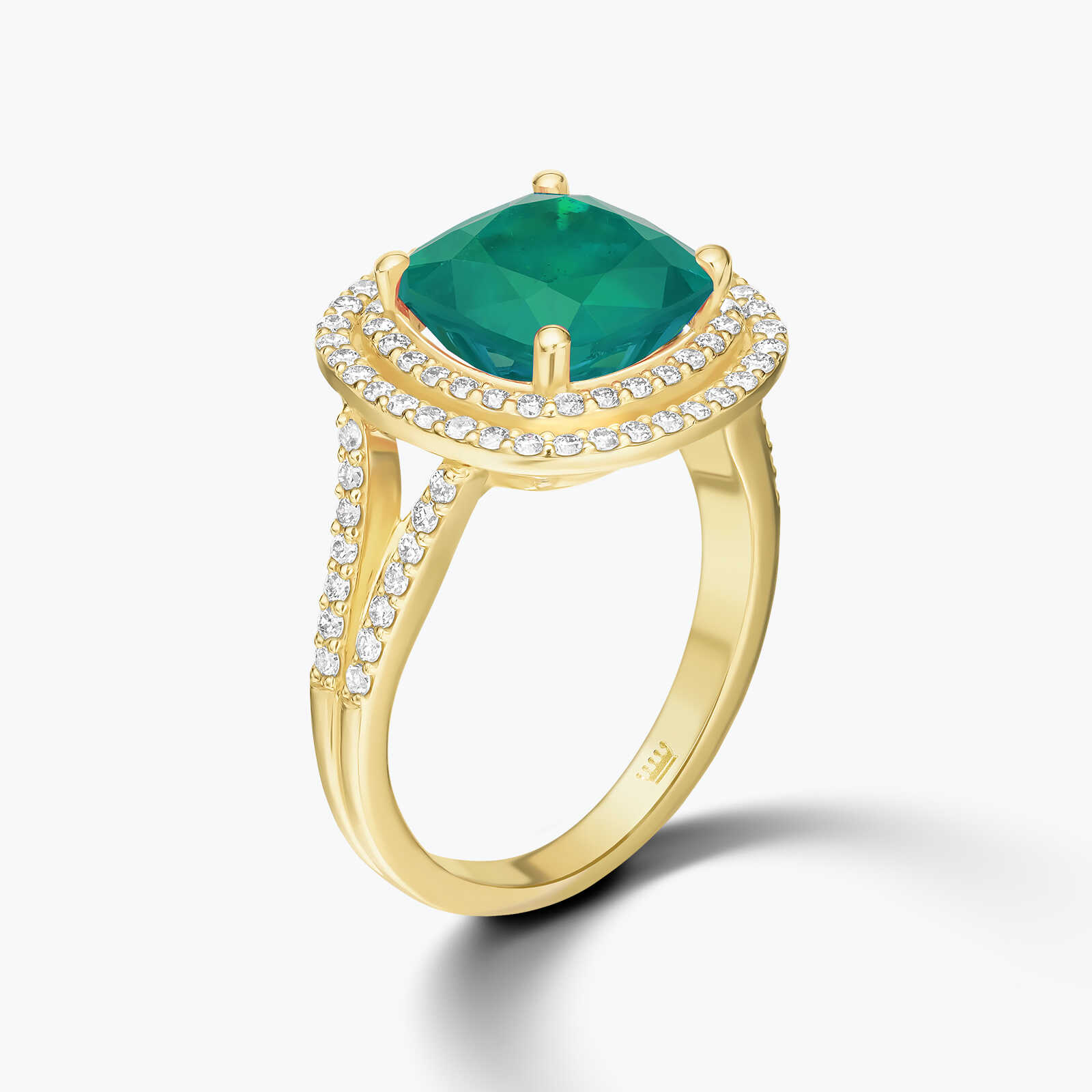 טבעת זהב בשיבוץ אגת ירוקה ויהלומים