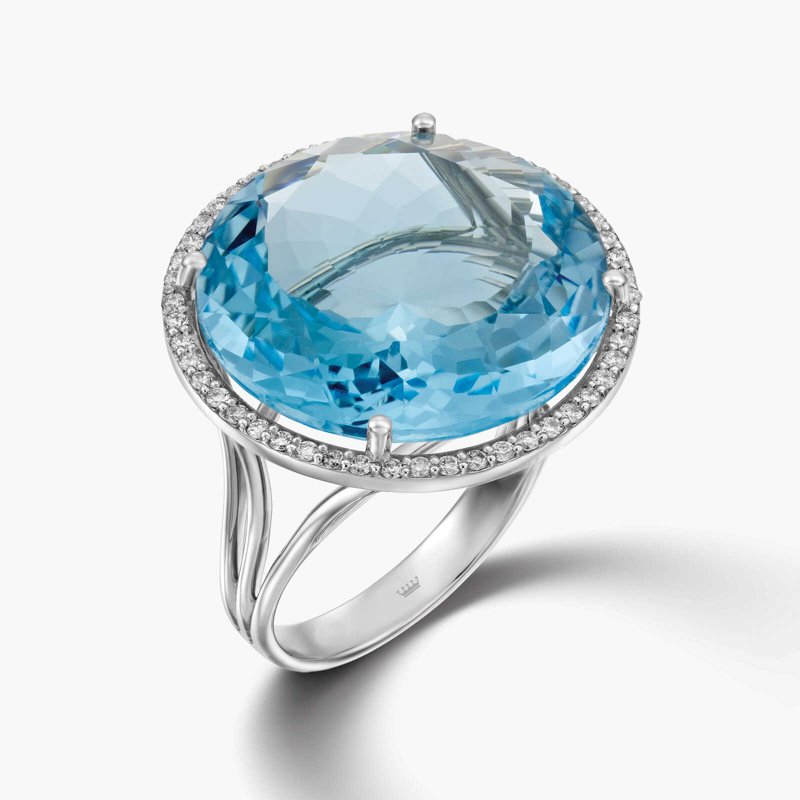 טבעת זהב 14K משובצת יהלומים ובלו טופז