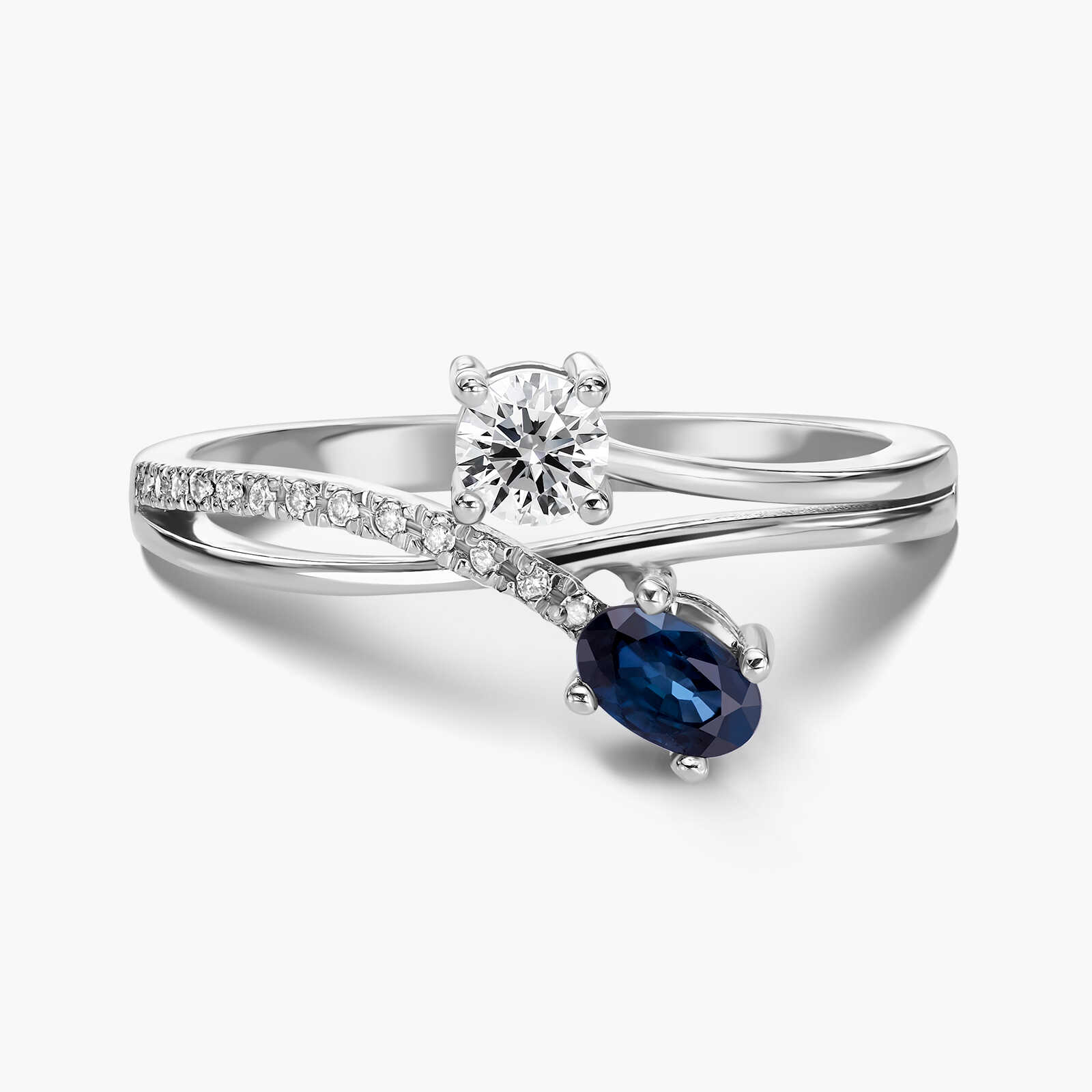 טבעת עם ראש כפול בשיבוץ יהלומים וספיר