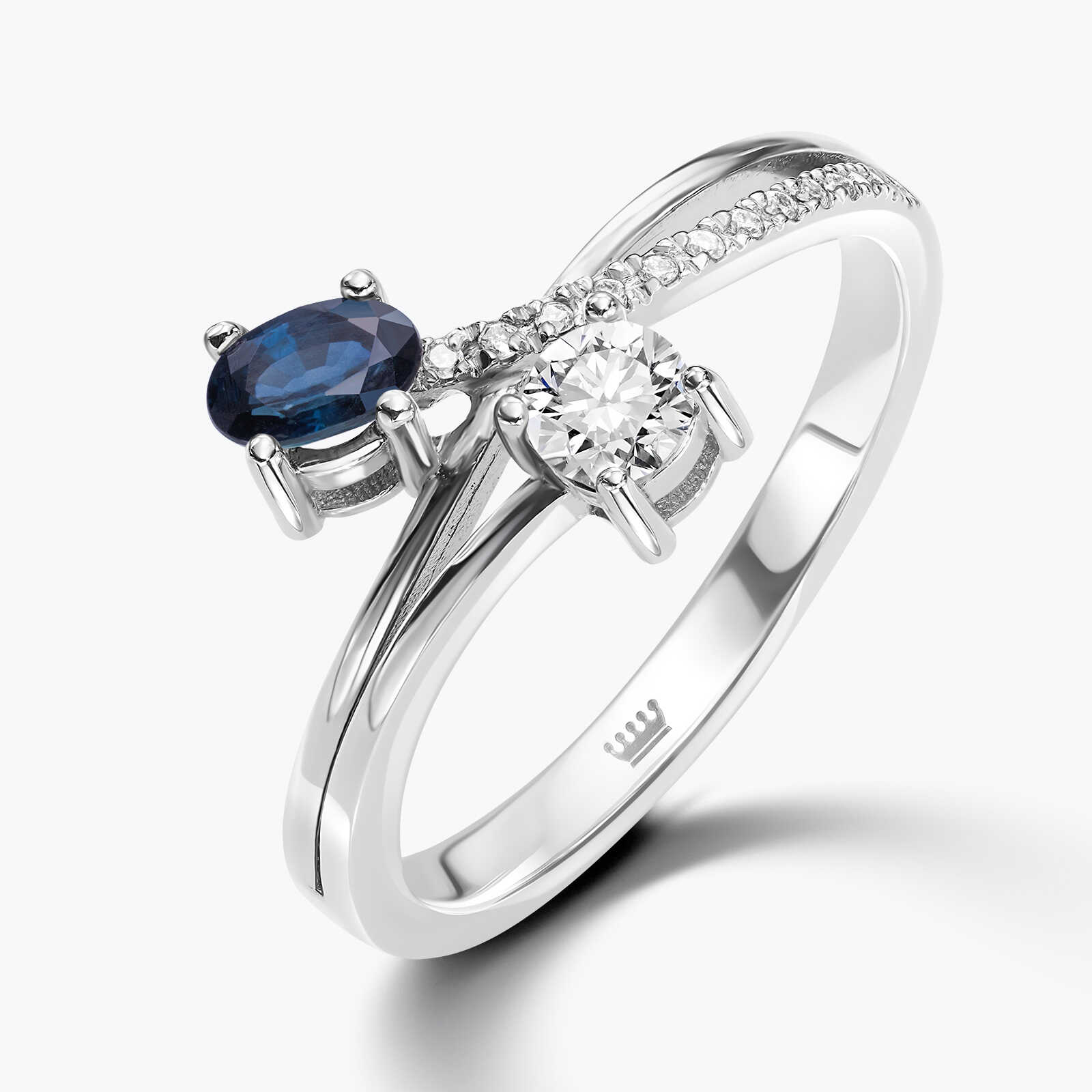 טבעת עם ראש כפול בשיבוץ יהלומים וספיר