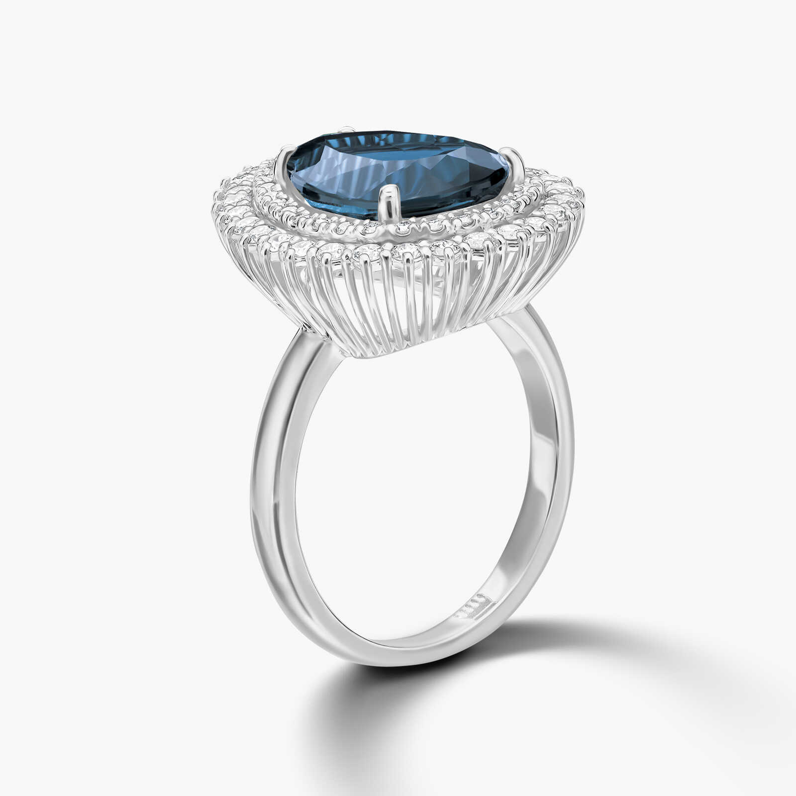 טבעת זהב עם ראש טיפה גדול בשיבוץ אבן טופז בלו לונדון ויהלומים