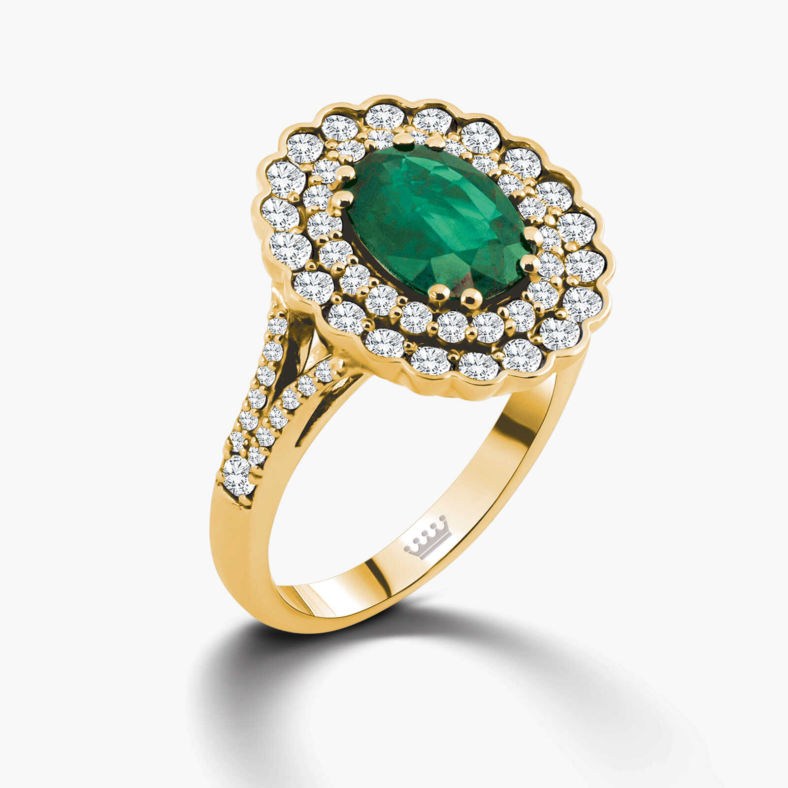 טבעת זהב בשיבוץ יהלומים ואמרלד