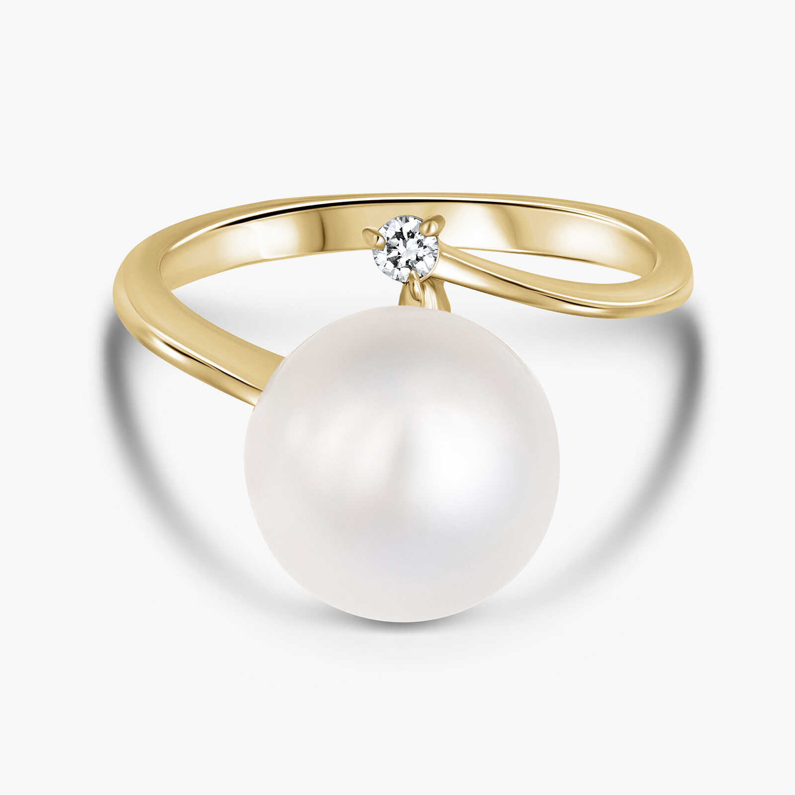 טבעת זהב בשיבוץ פנינה ויהלום