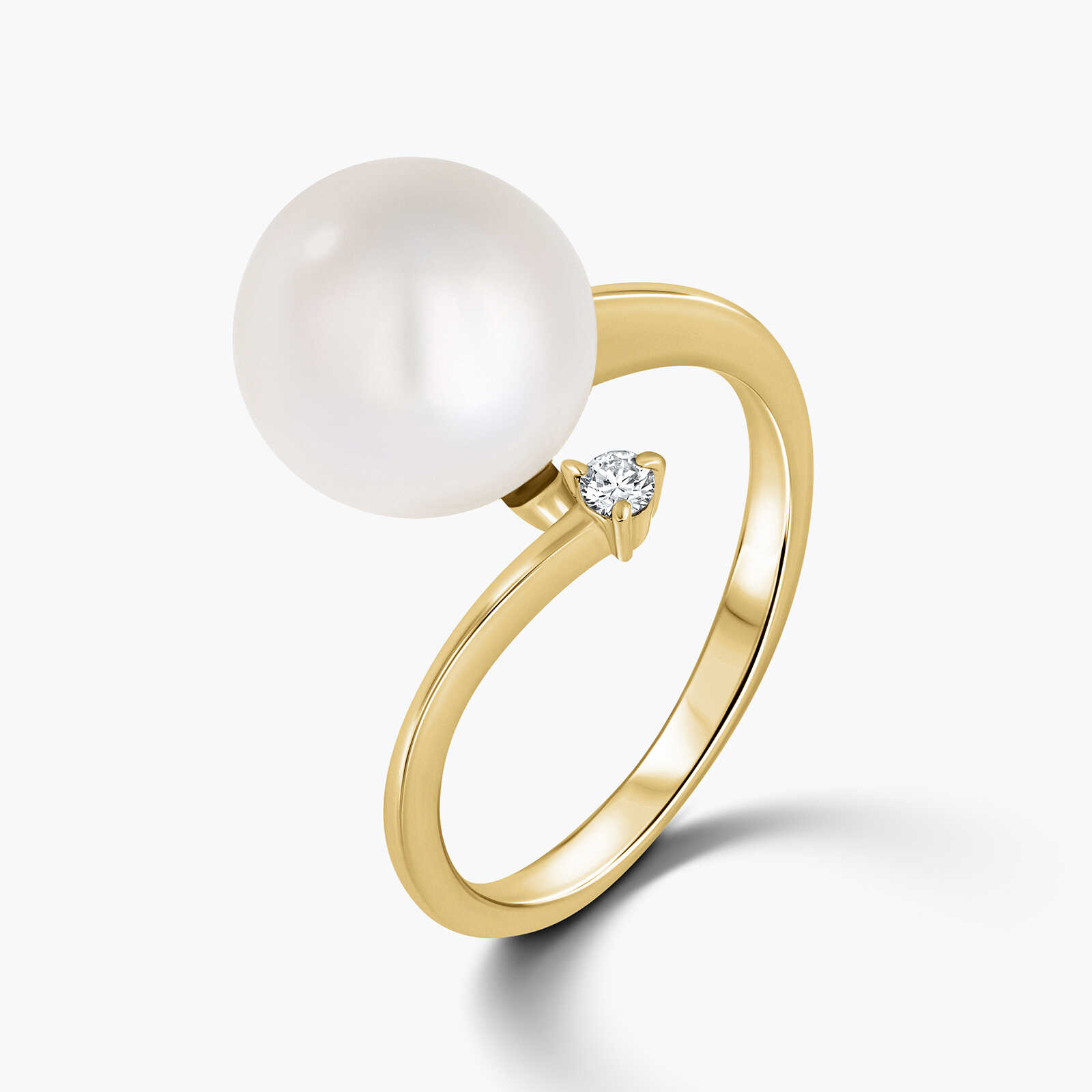 טבעת זהב בשיבוץ פנינה ויהלום