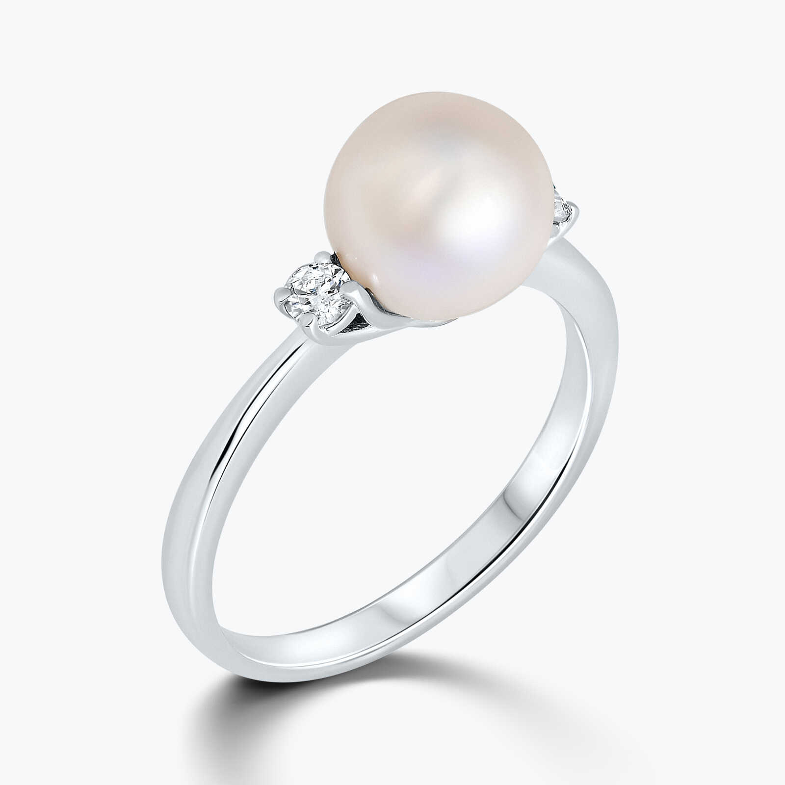 טבעת זהב בשיבוץ פנינה ויהלומים