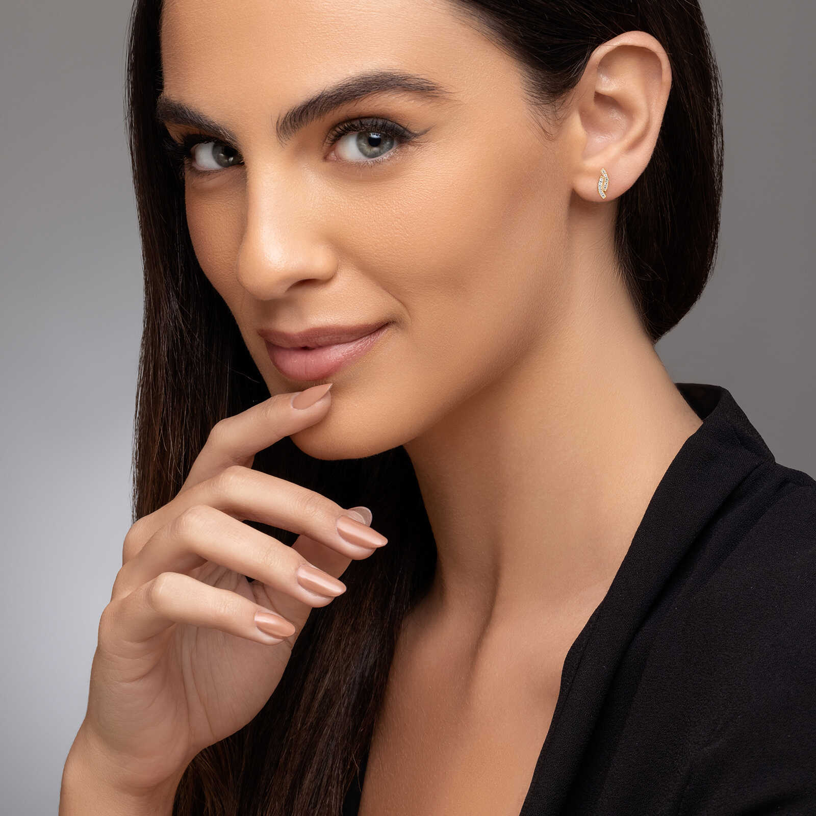 עגילי זהב גלי- משובצים זרקונים נוצצים