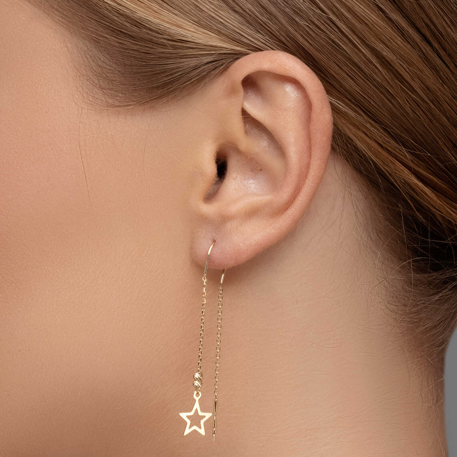 עגילי זהב נלי-  תלויים עם סיומת כוכב