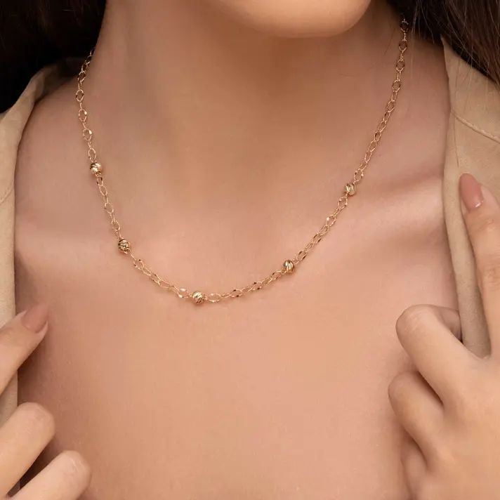 שרשרת חוליות זהב עם 5 כדוריות זהב