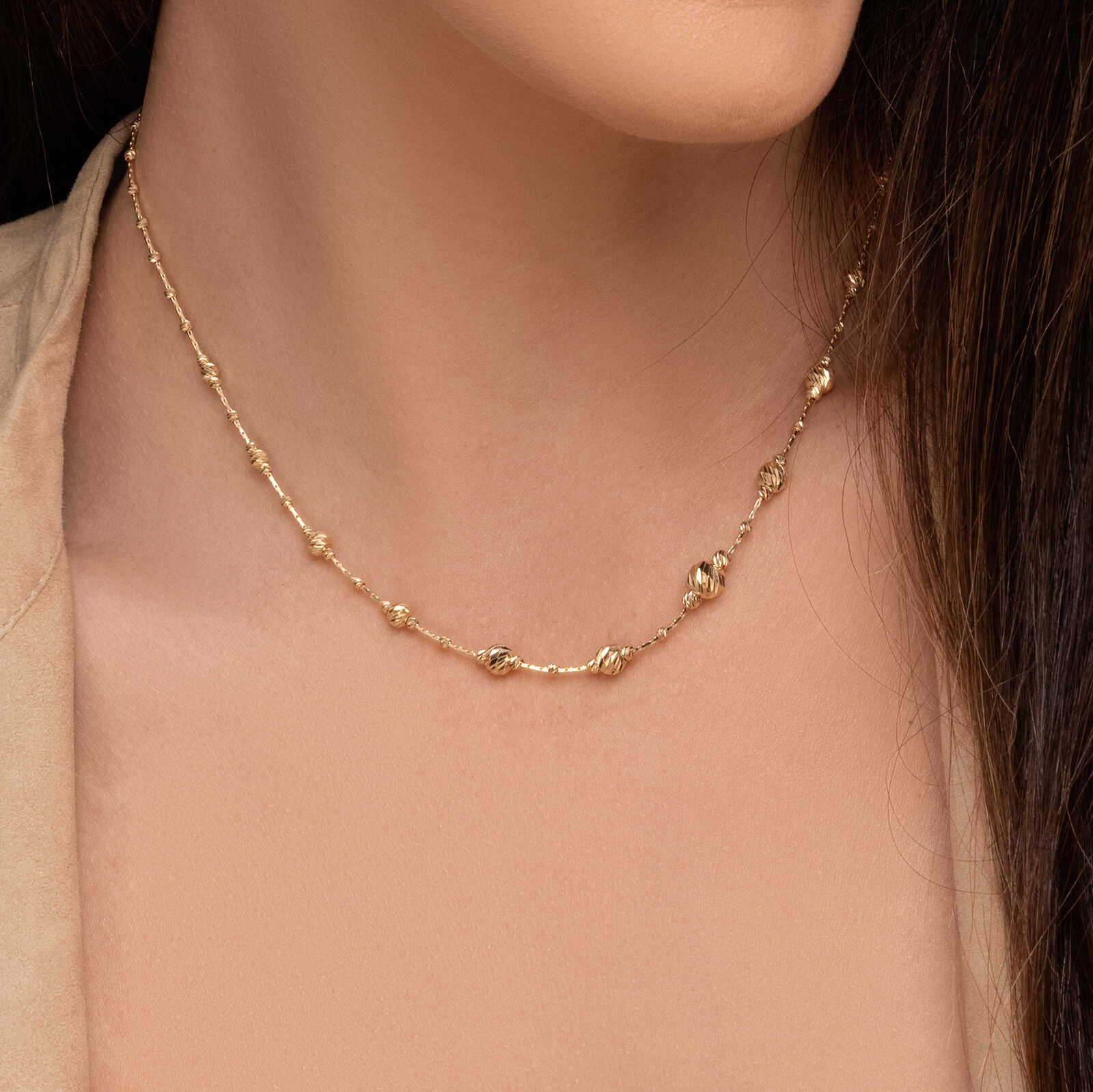 שרשרת זהב עם כדורי זהב בעיבוד לייזר בגווני זהב צהוב ולבן